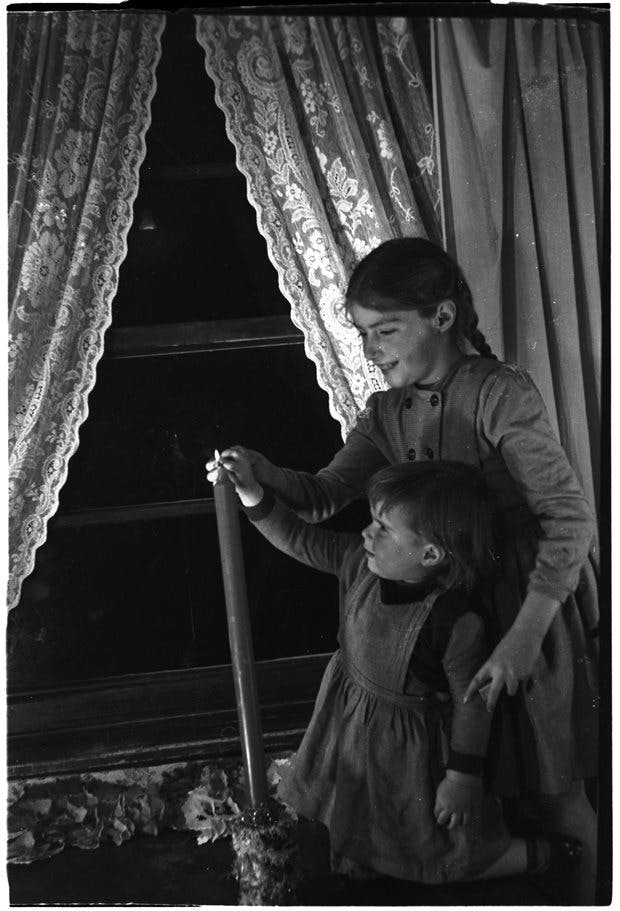 Twelve Days of Irish Holiday Traditions Light a Candle