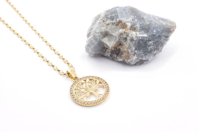 Striking Yellow Gold Tree of Life Necklace For Women. Pictured Flat.