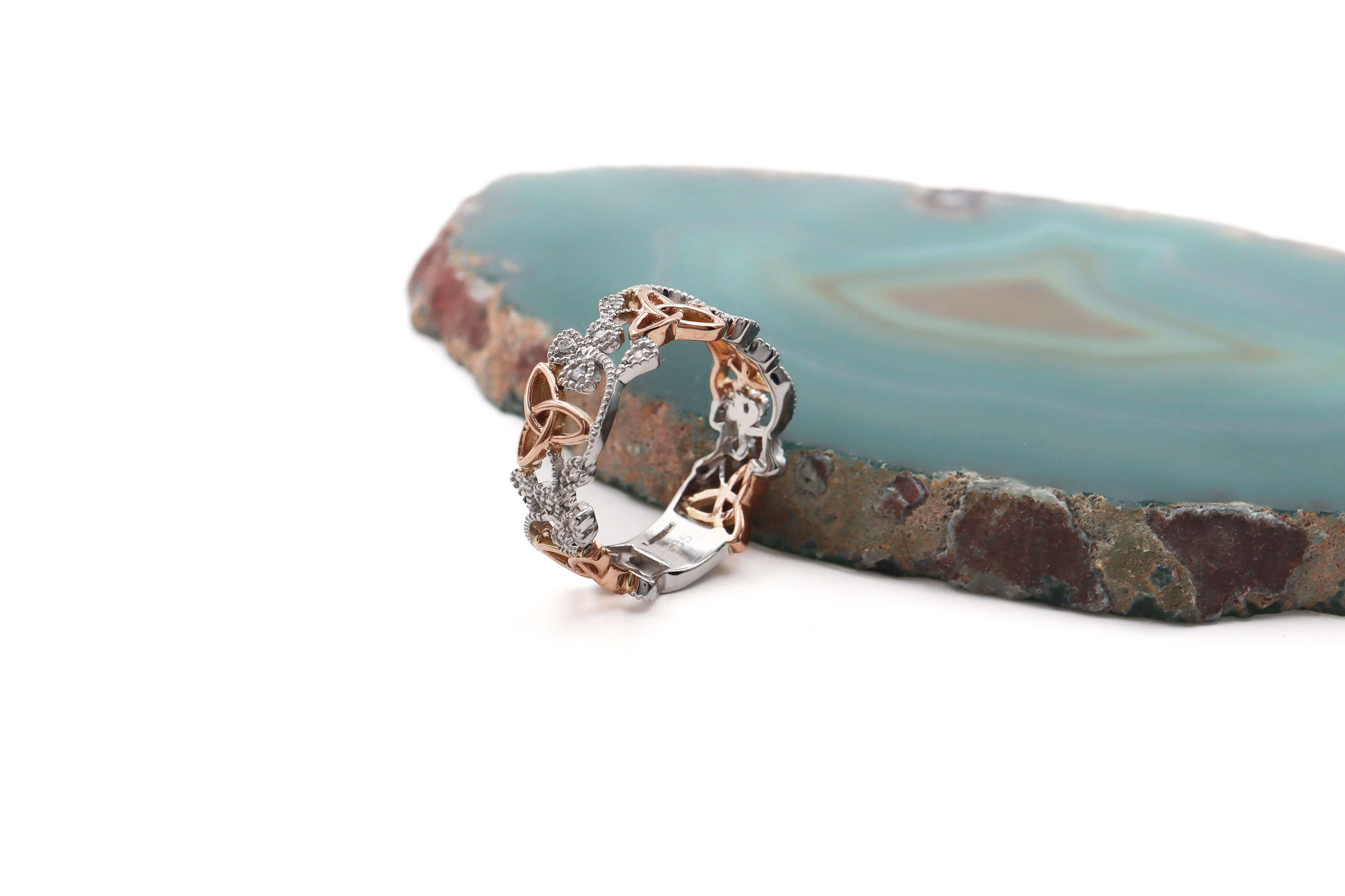 Gorgeous White Gold & Rose Gold Shamrock & Trinity Knot Ring For Women With a Polished Finish. Side View.