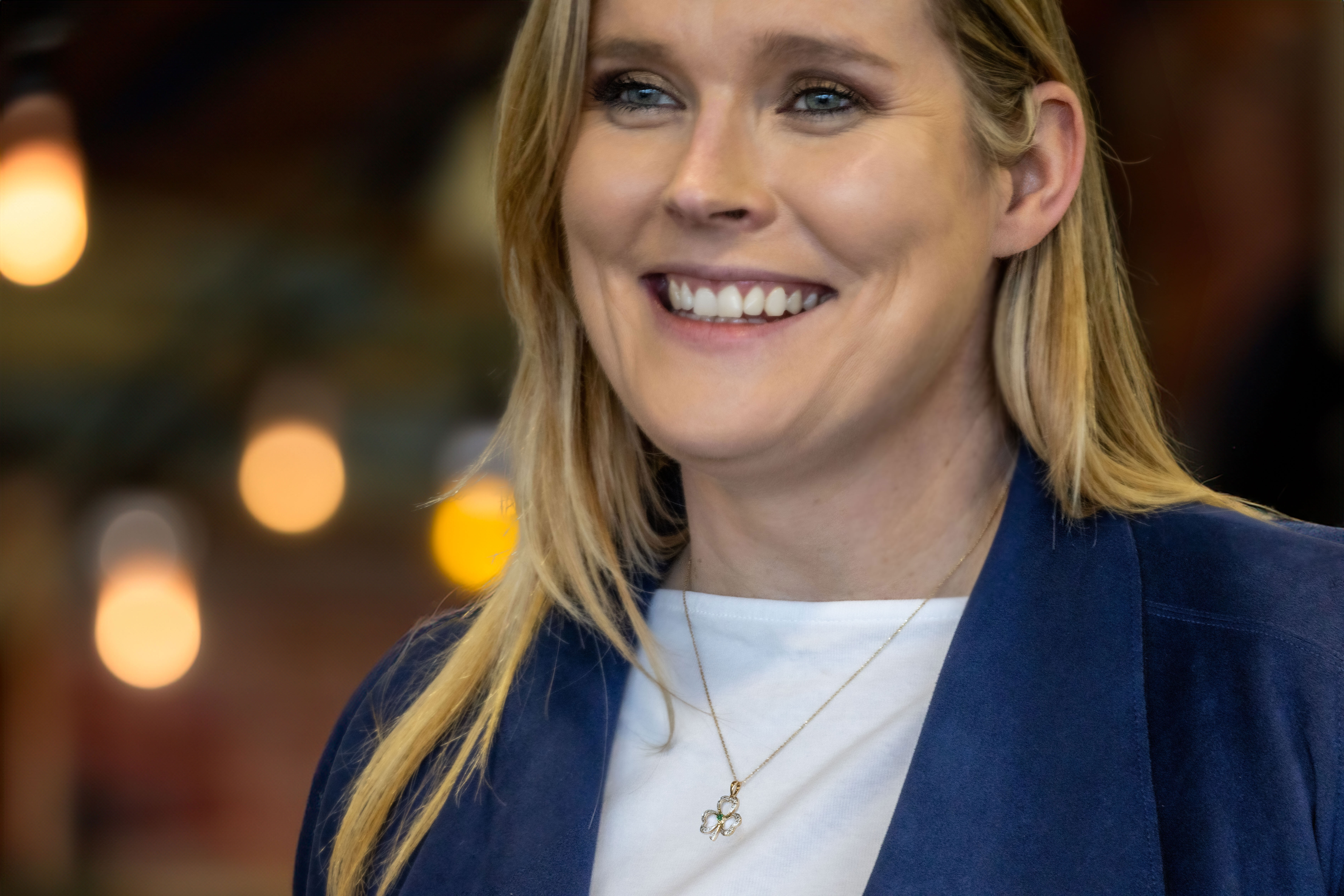 Luxurious 14K Yellow Gold Shamrock Necklace For Women - Model Photo