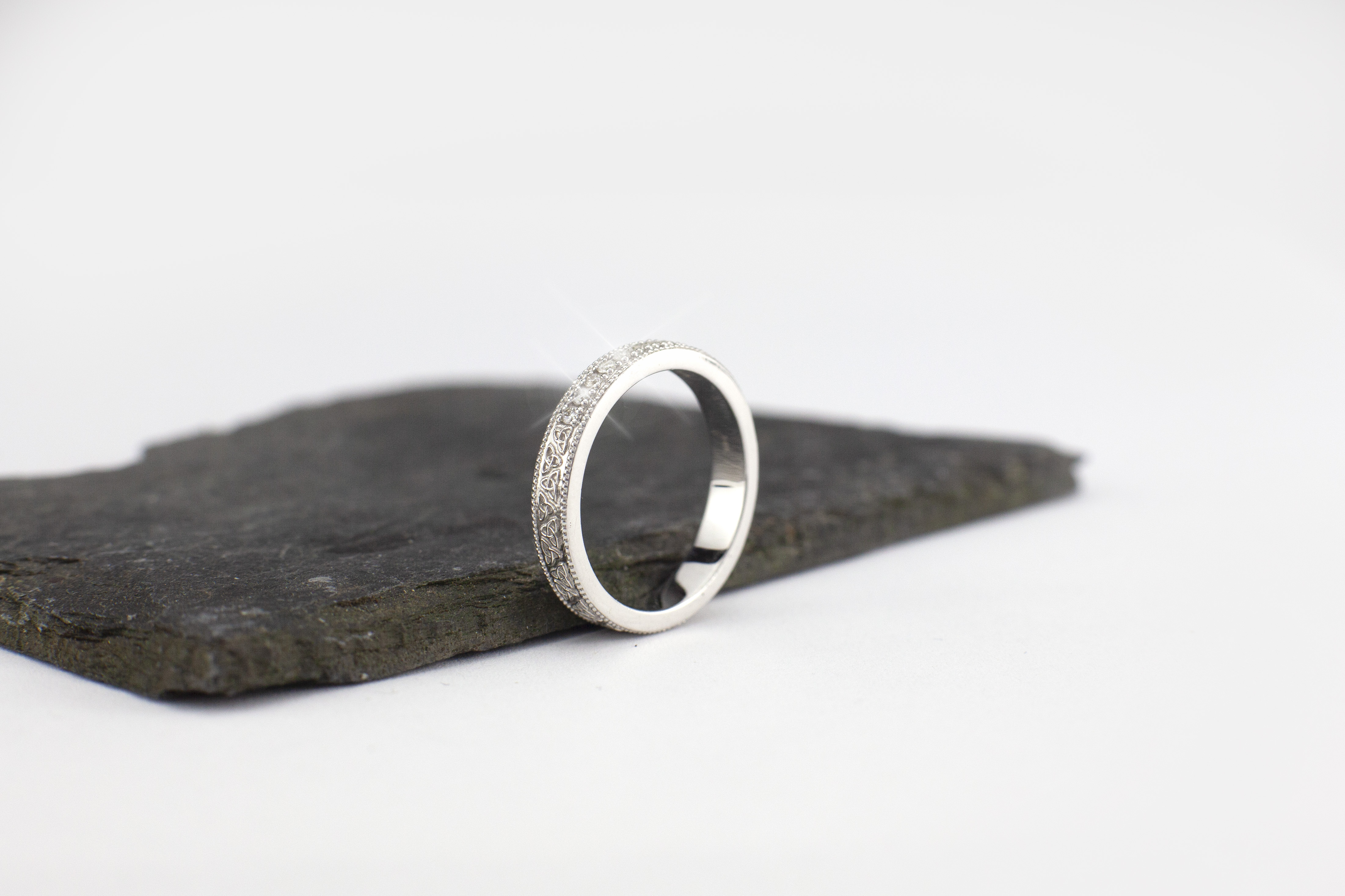 Womens Trinity Knot Wedding Ring in White Gold. Side View.