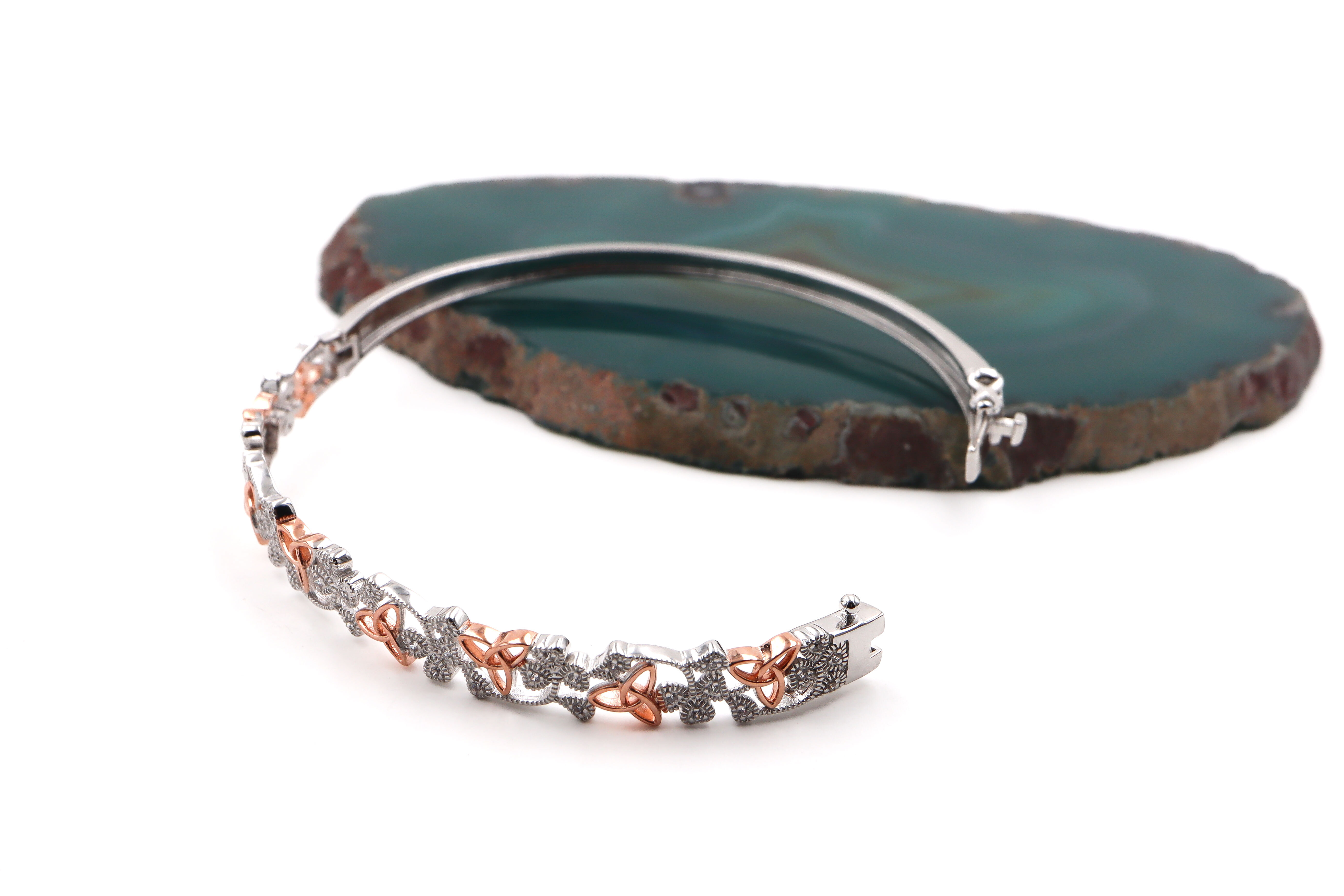 Attractive Sterling Silver Trinity Knot & Shamrock Bangle For Women. Photographed Open.