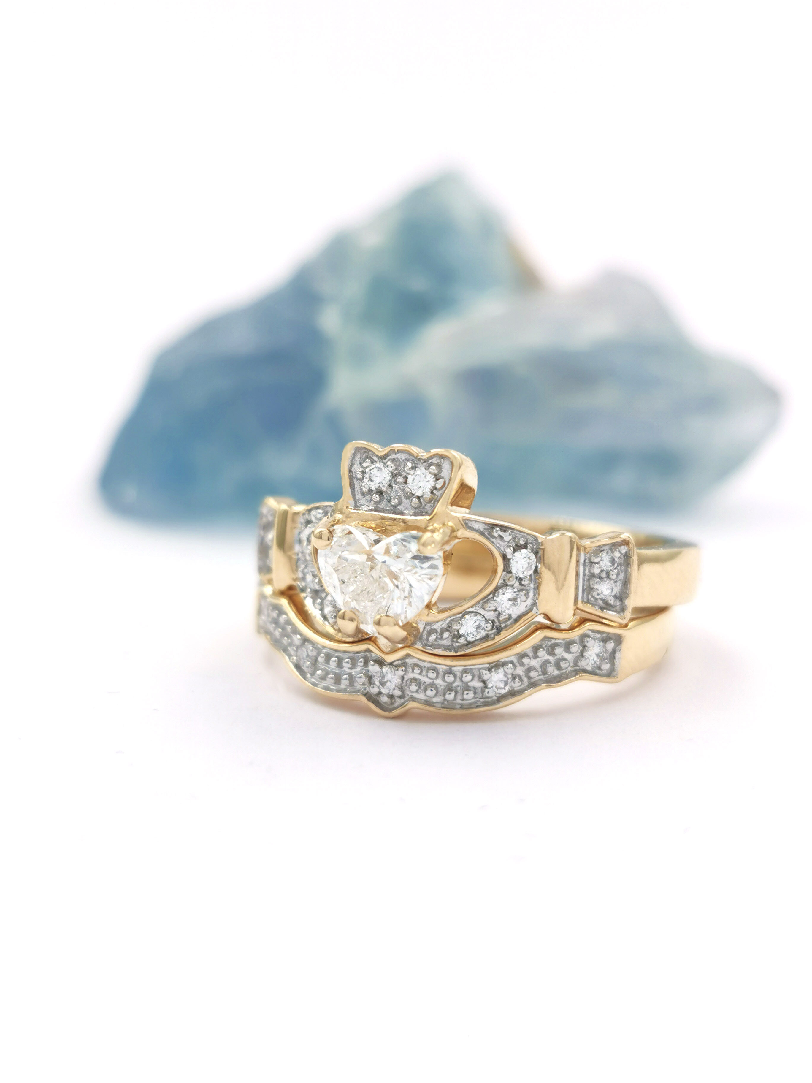 Womens Claddagh Ring in Yellow Gold With a Polished Finish. Side View.