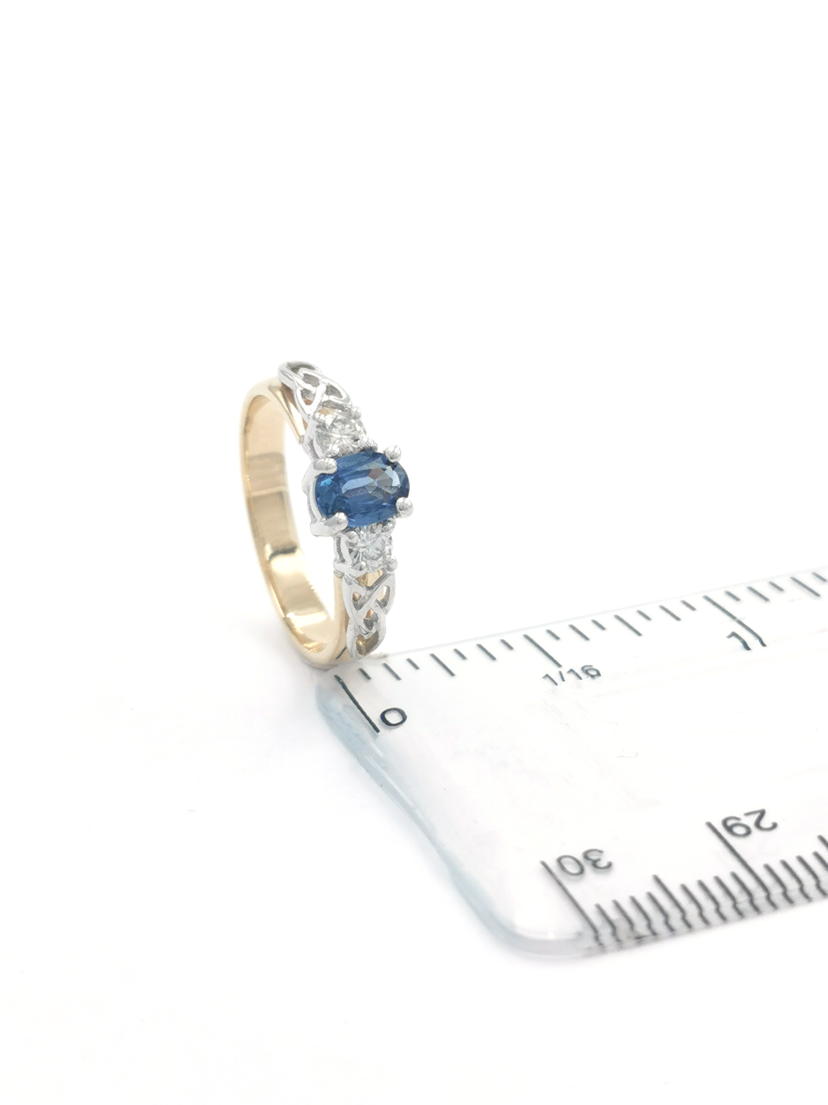 Genuine Yellow Gold & White Gold Trinity Knot Engagement Ring For Women With a Polished Finish. Picture For Scale.