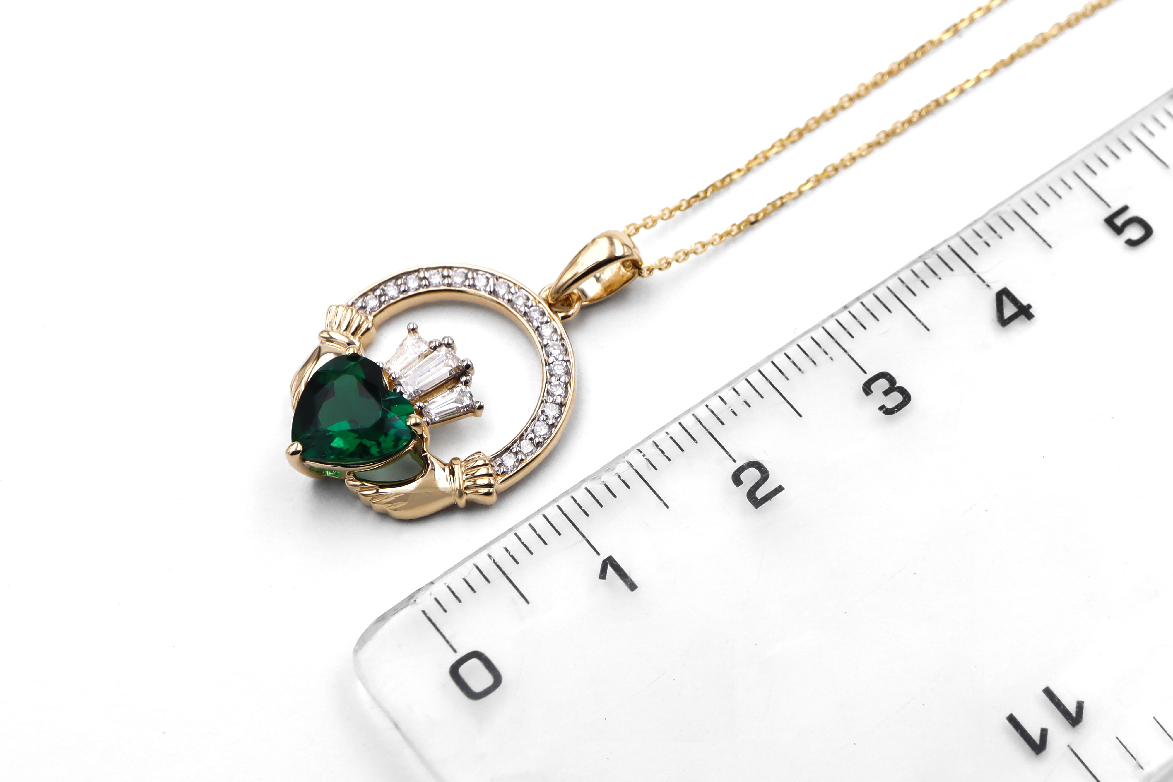14k Yellow Gold Small Diamond Crowned 2ct Emerald Claddagh Necklace Sku 25236 ruler