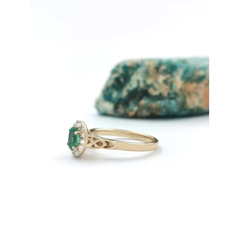 Womens Polished Trinity Knot 0.50ct Natural Emerald Engagement Ring in Real Yellow Gold. Side View.