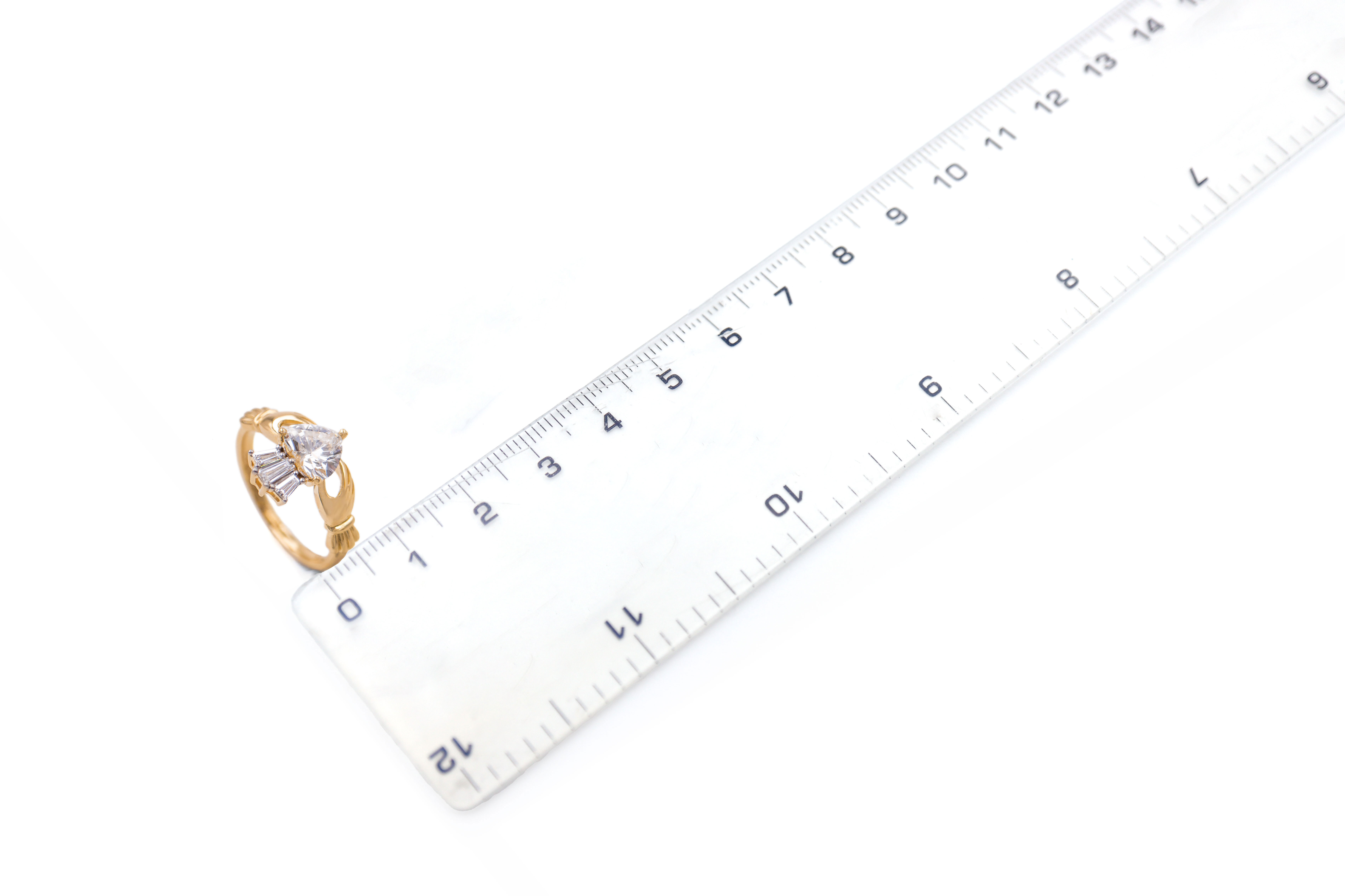 Real 14K Yellow Gold Claddagh 1.00ct Lab Grown Diamond Ring With a Polished Finish For Women. Picture For Scale.