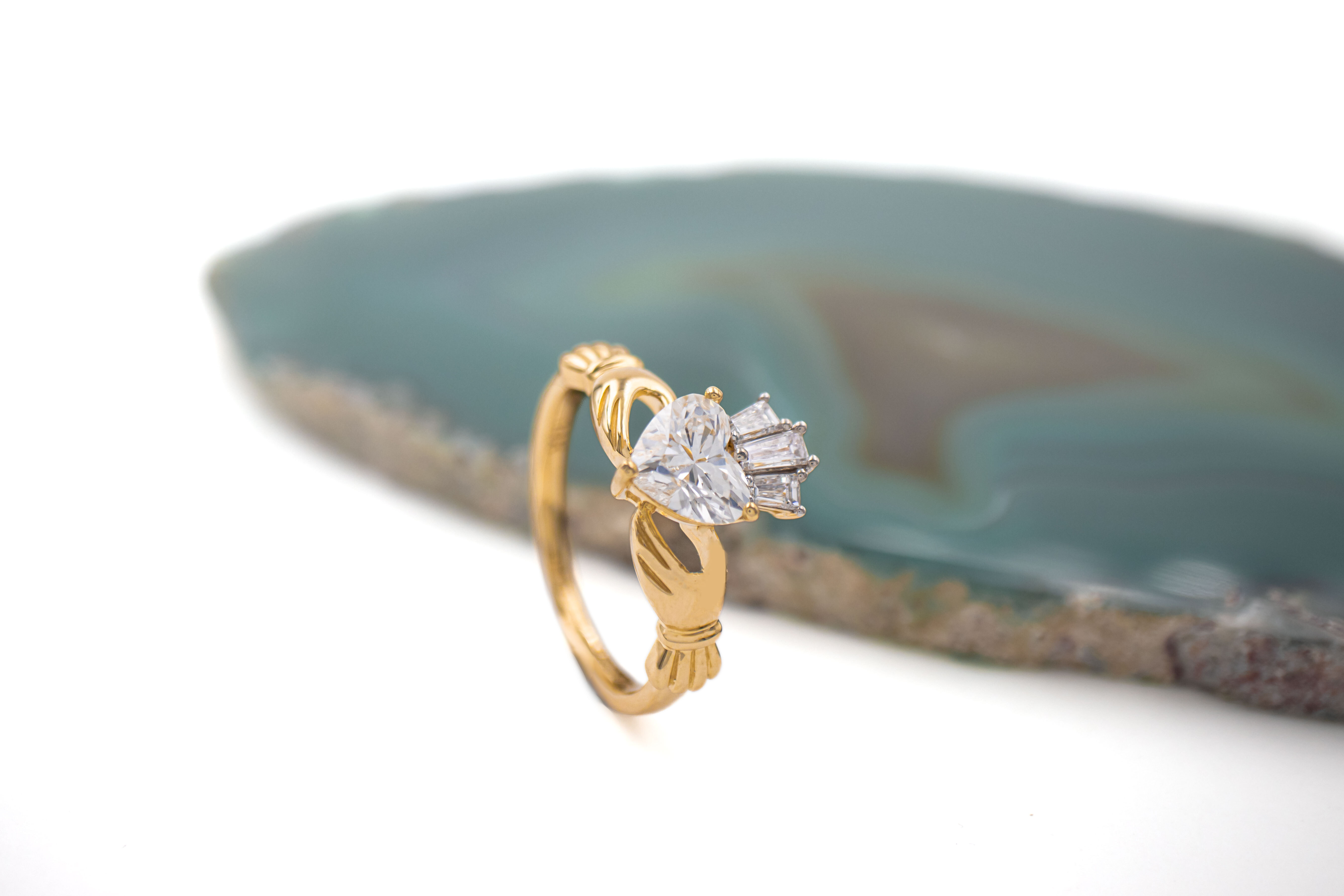 Authentic 14K Yellow Gold Claddagh Engagement Ring For Women With a Polished Finish. Side View.