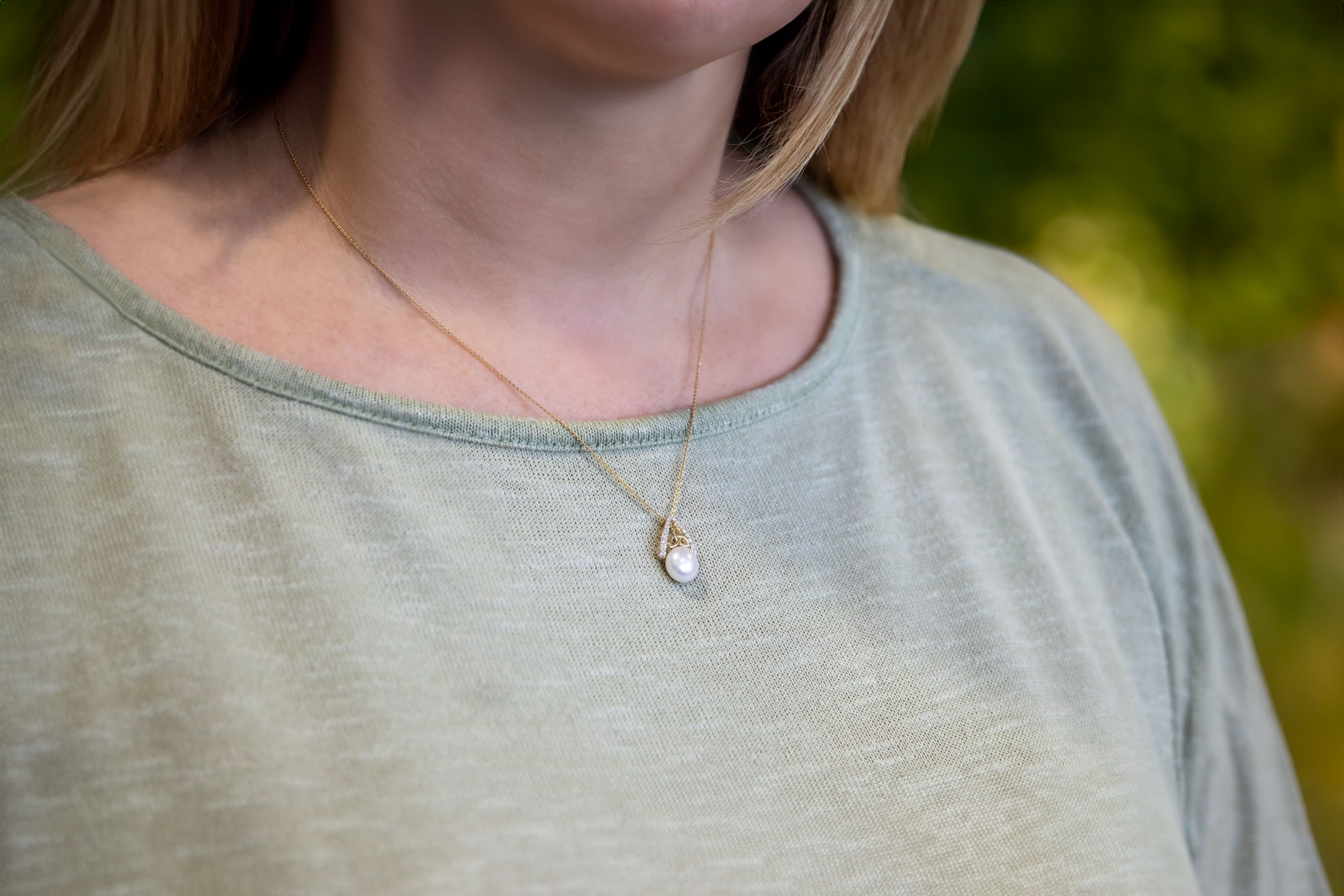 Womens Polished Trinity Knot Necklace in Real 14K Yellow Gold - Model Photo