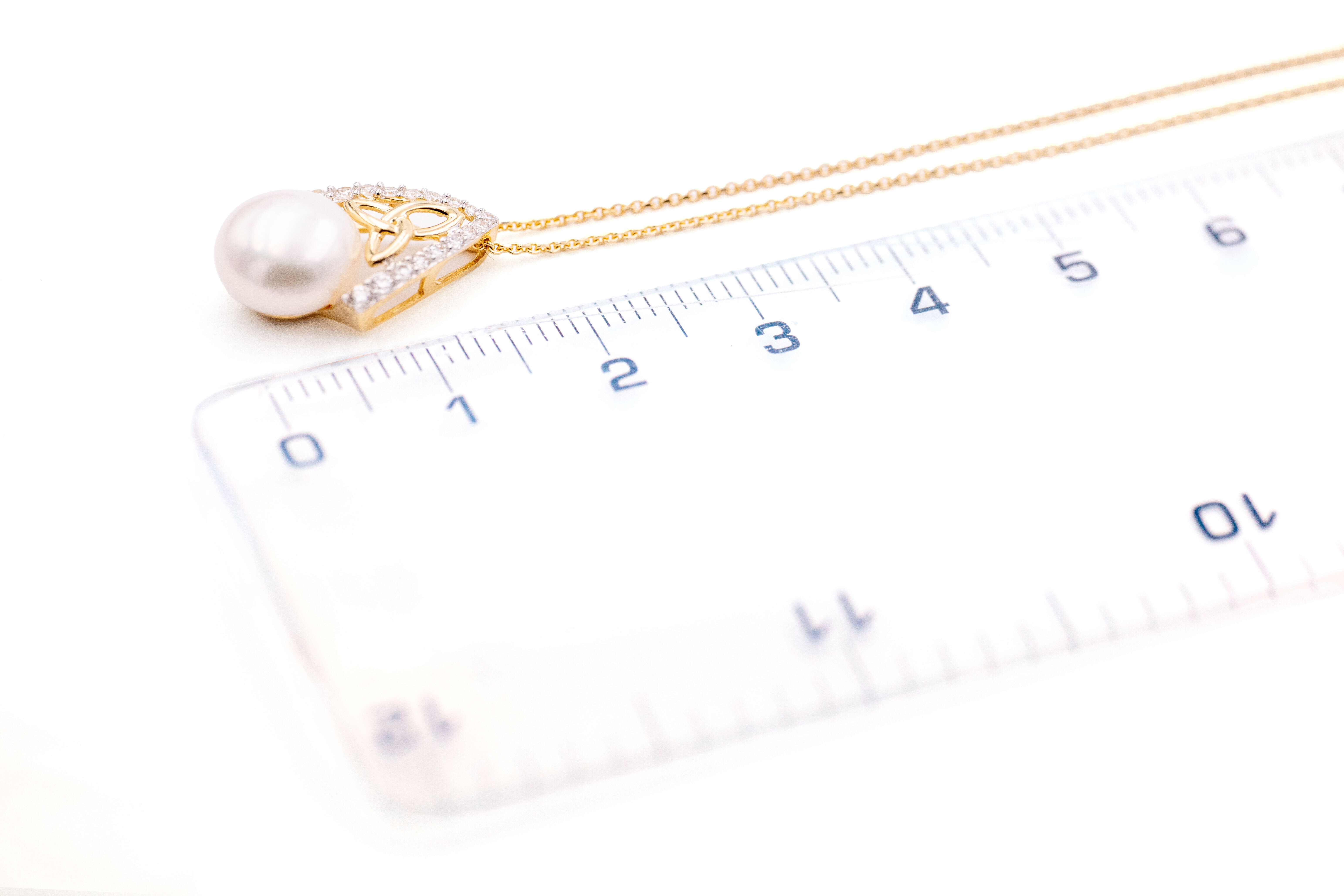 Womens Irish Polished 14K Yellow Gold Trinity Knot Necklace. Picture For Scale.