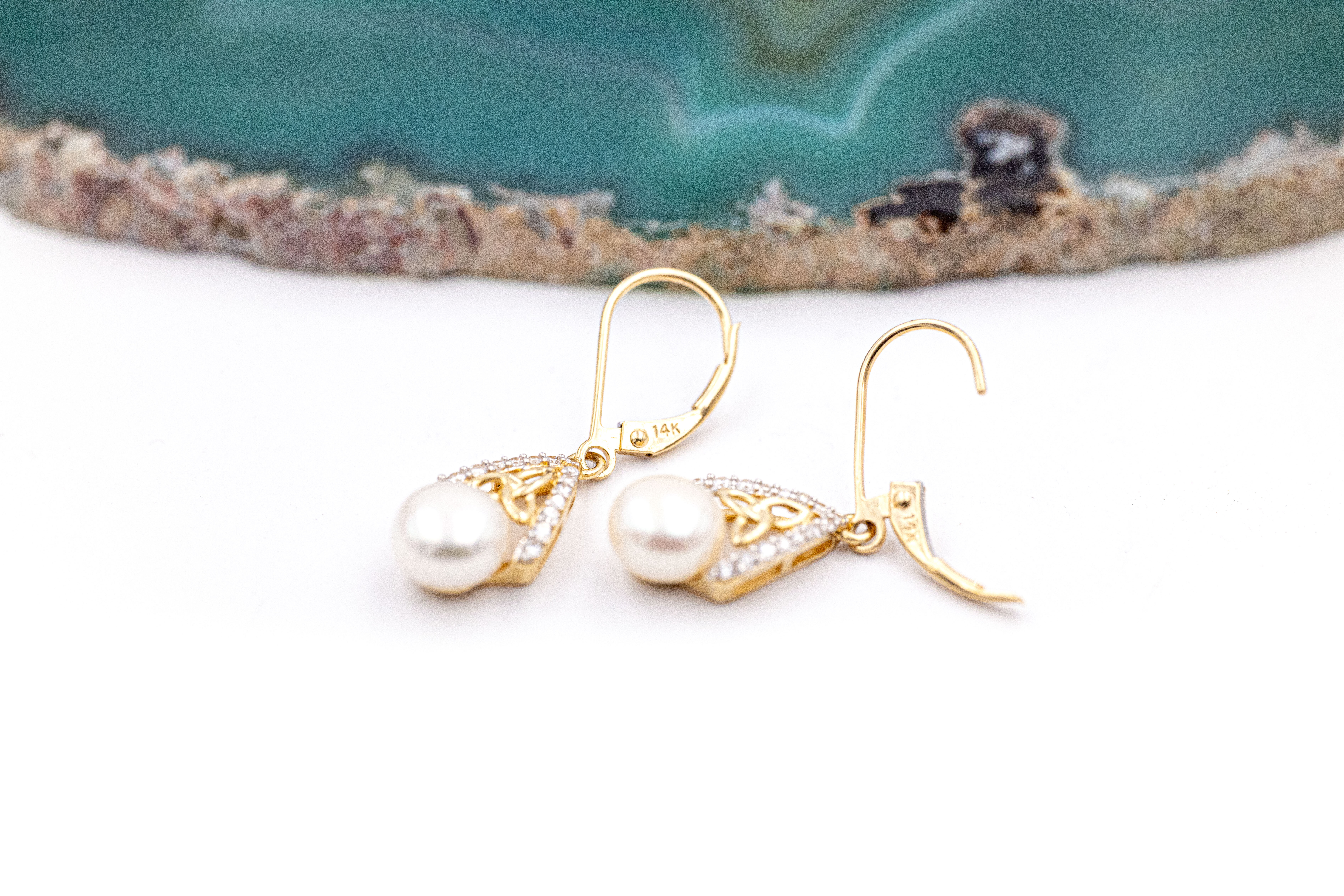 Striking Yellow Gold Trinity Knot Earrings For Women With a Polished Finish