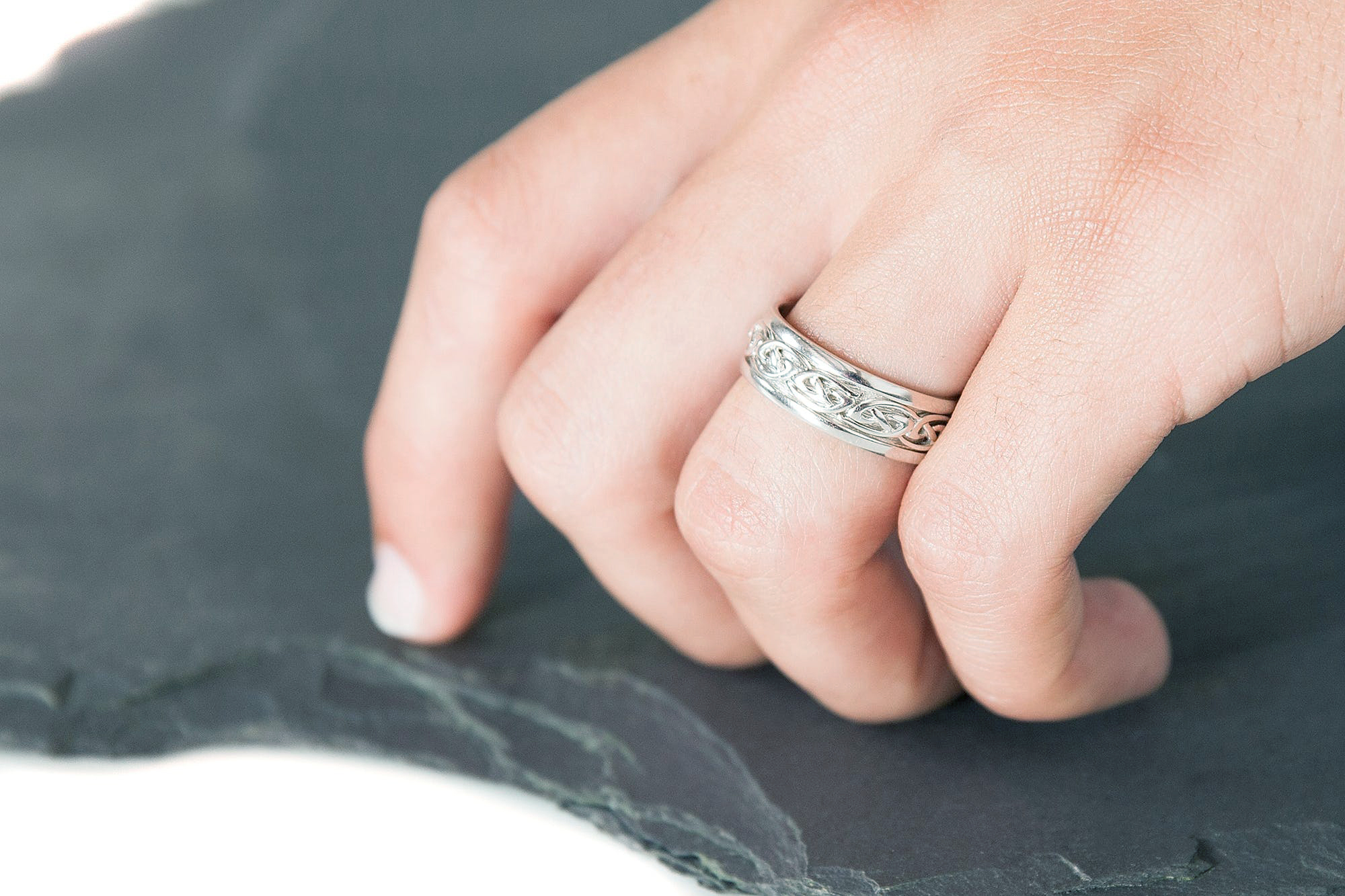 Striking Sterling Silver Celtic Knot Wedding Ring For Men - Model Photo