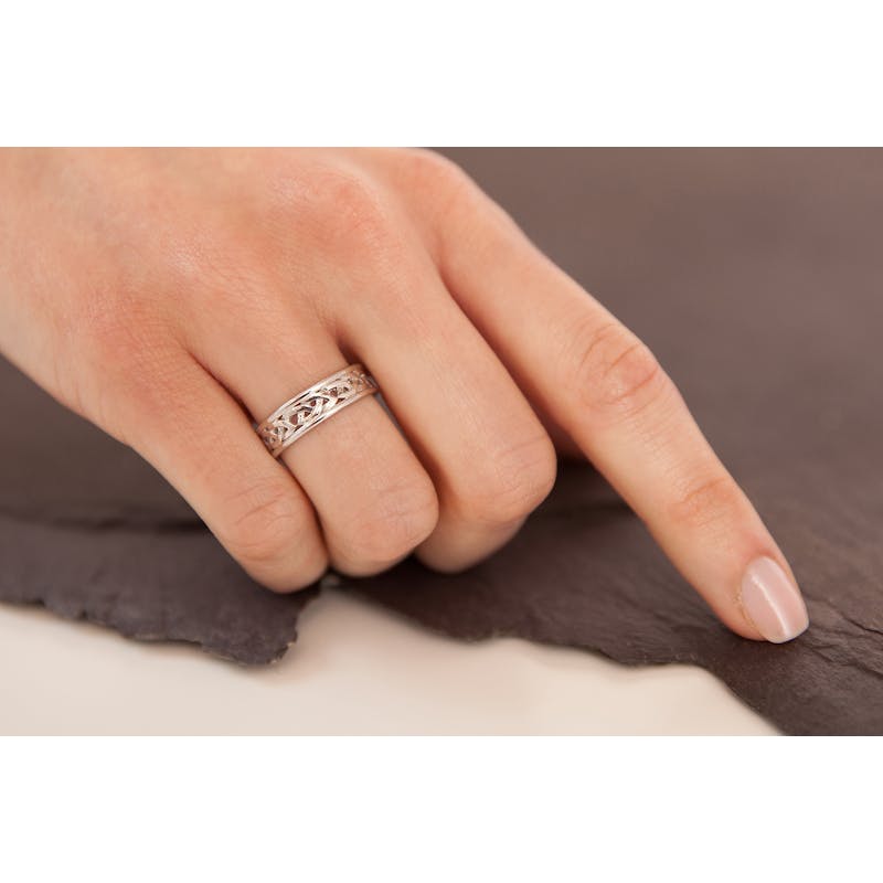 Striking 14K White Gold Celtic Knot 6.9mm Ring For Women - Model Photo