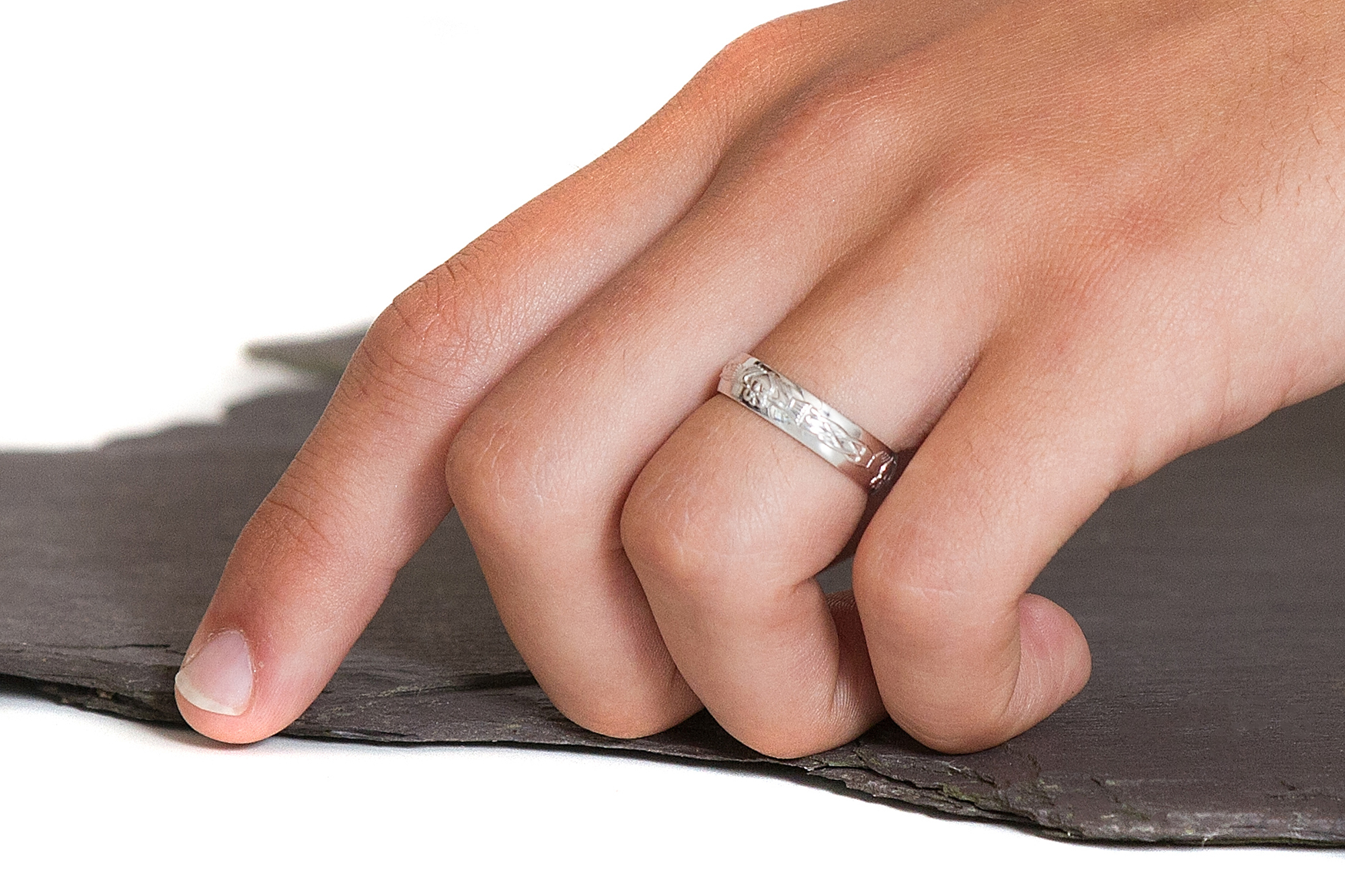 Striking Platinum Claddagh Wedding Ring For Men - Model Photo