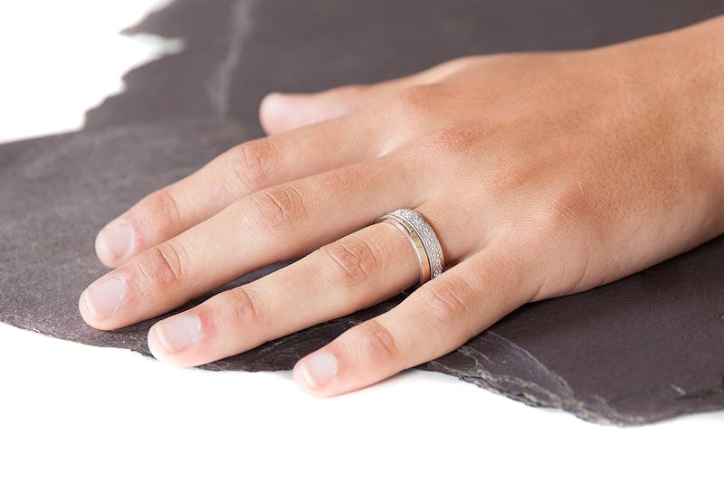 Authentic 10K White Gold & Yellow Gold Ogham 7.3mm Ring With a Florentine Finish - Model Photo
