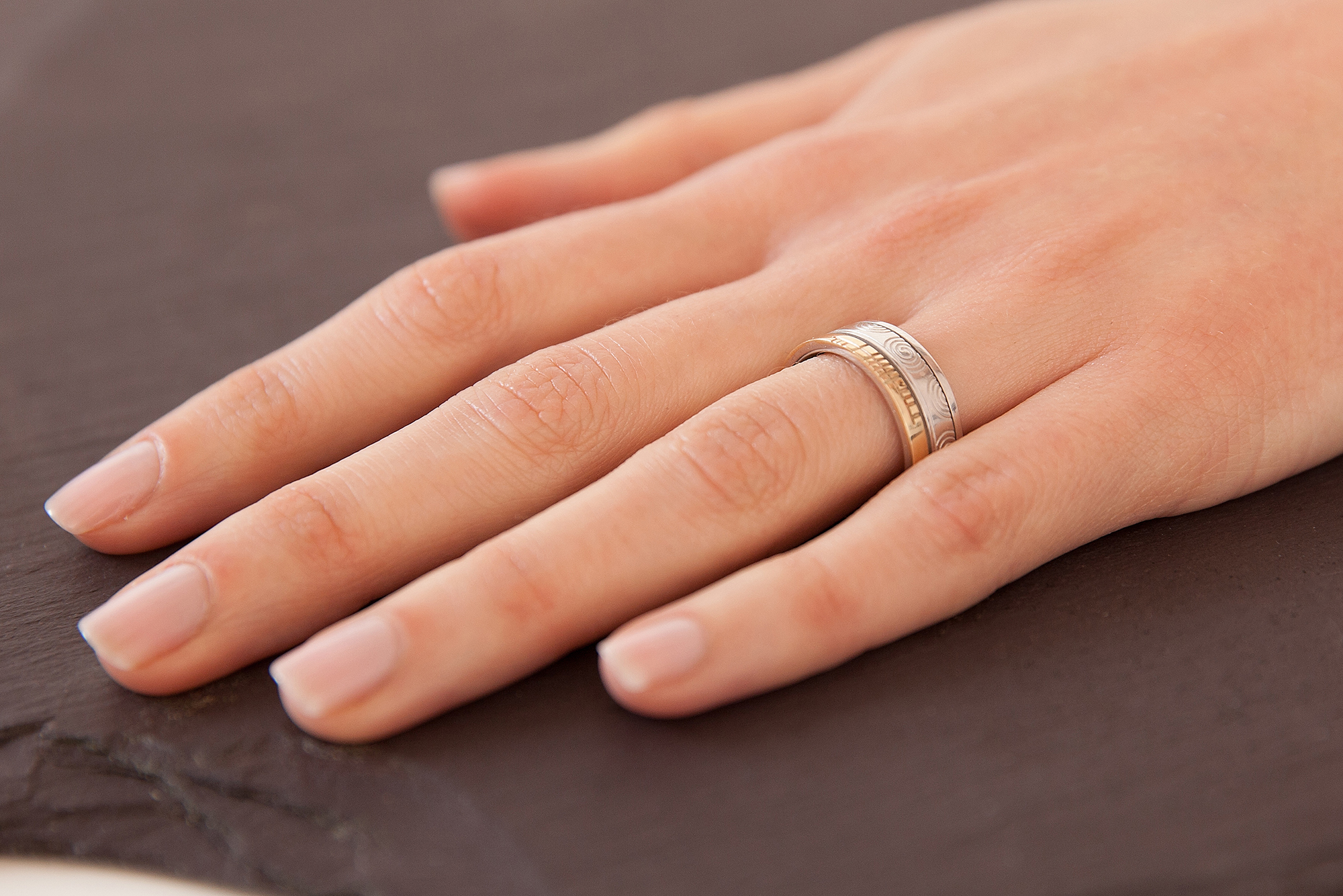 Attractive 14K White Gold & Yellow Gold Ogham Wedding Ring - Model Photo