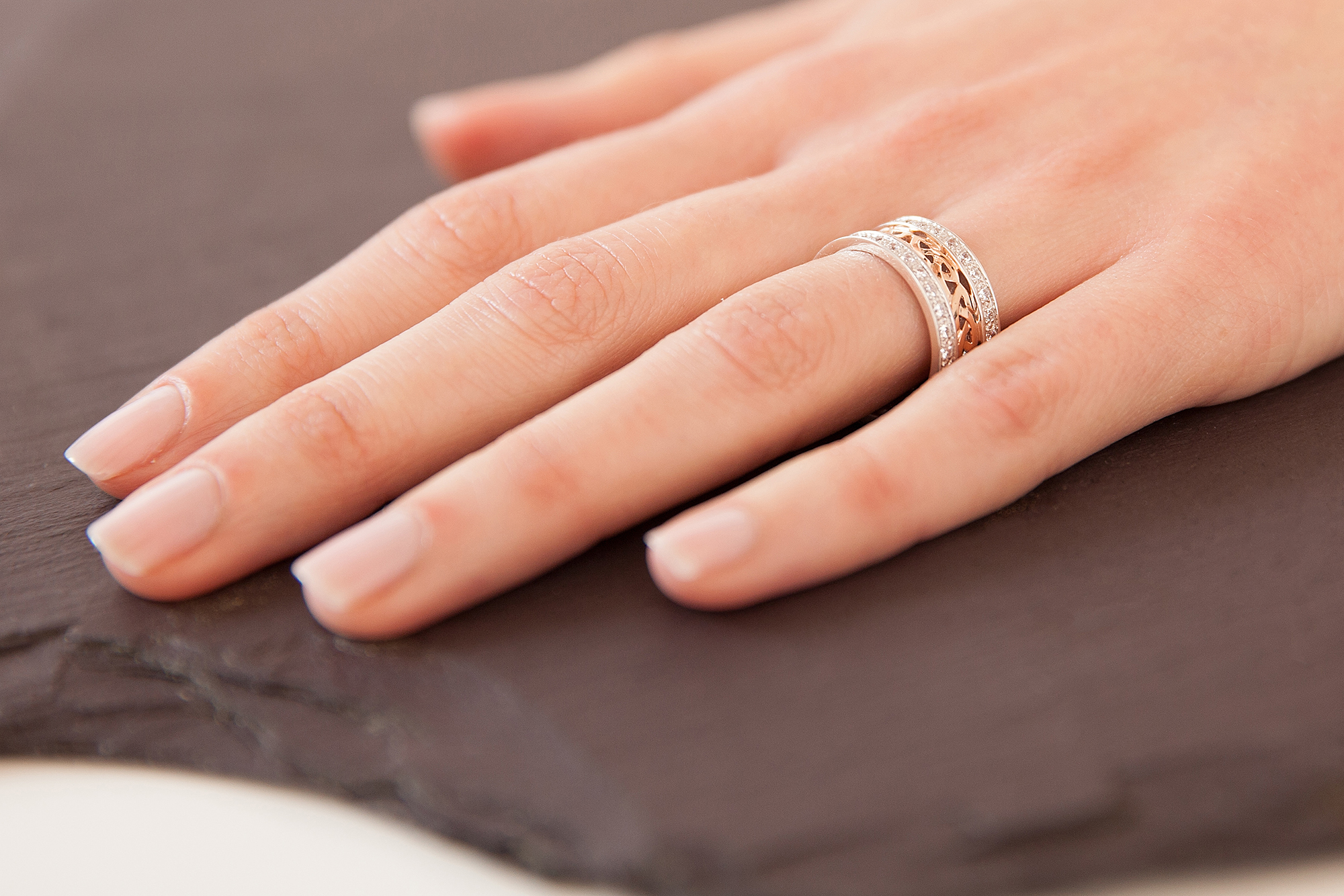 Luxurious 14K Rose Gold Celtic Knot 9.0mm Ring For Women - Model Photo