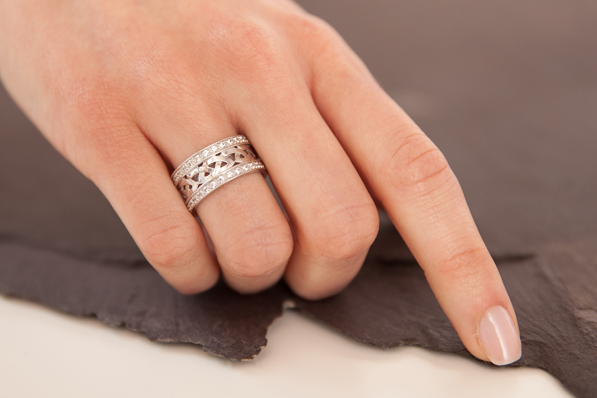 Striking 14K White Gold Celtic Knot 9.0mm Ring For Women - Model Photo