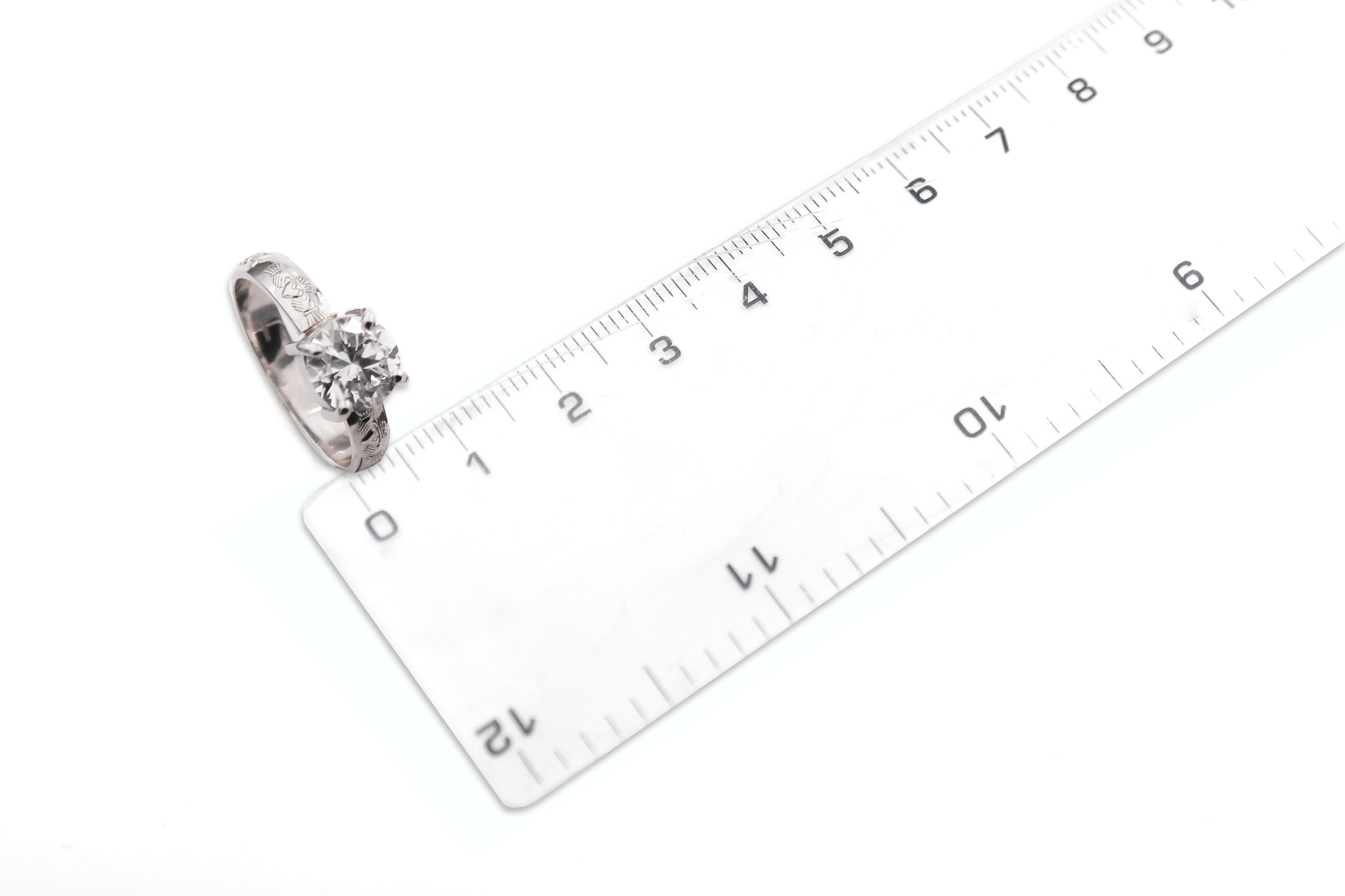 Attractive Platinum 950 Claddagh 4.0mm Ring For Women With a Polished Finish. Picture For Scale.