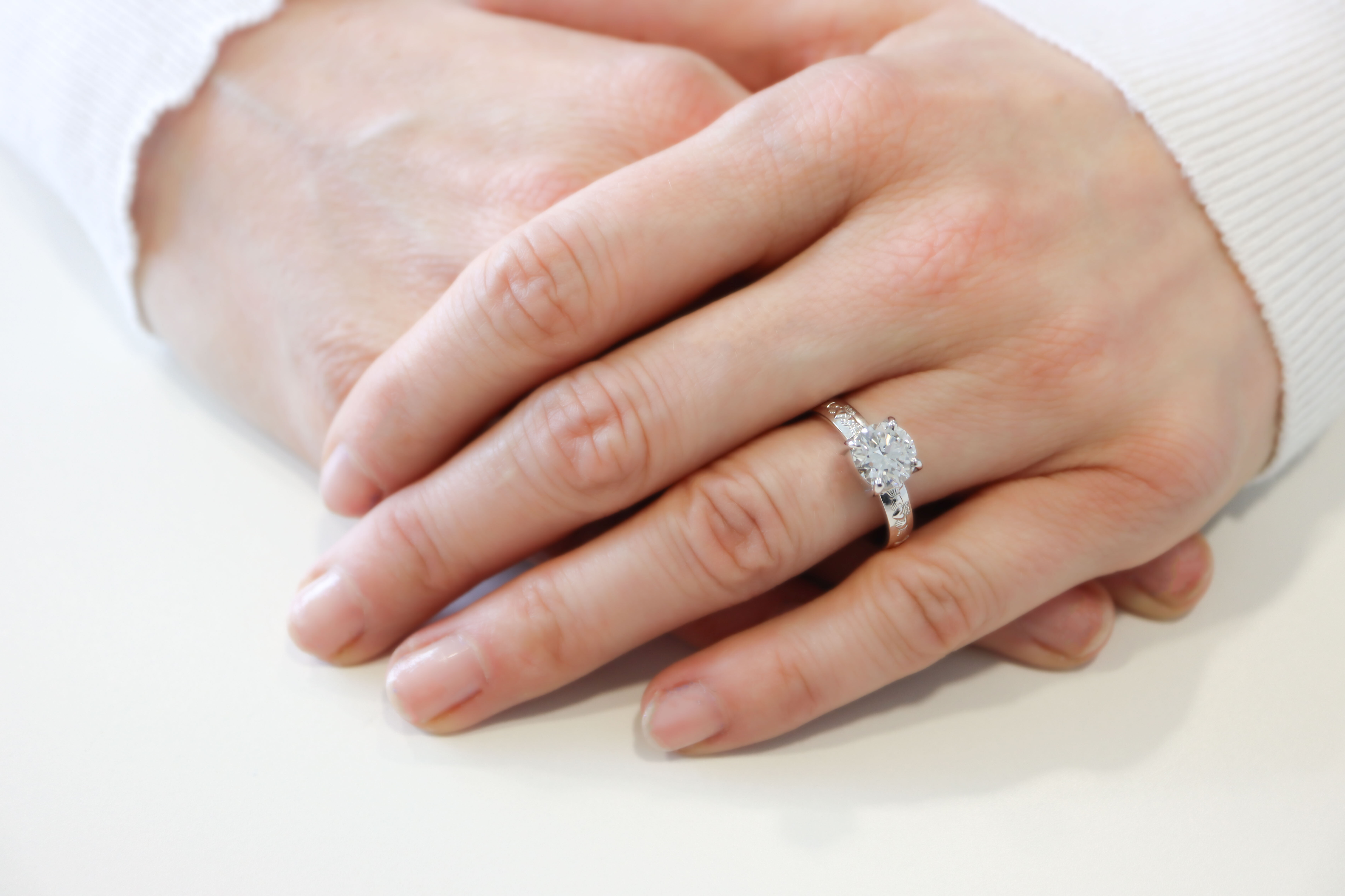 Real Platinum 950 Claddagh & Celtic Knot Engagement Ring For Women With a Polished Finish - Model Photo