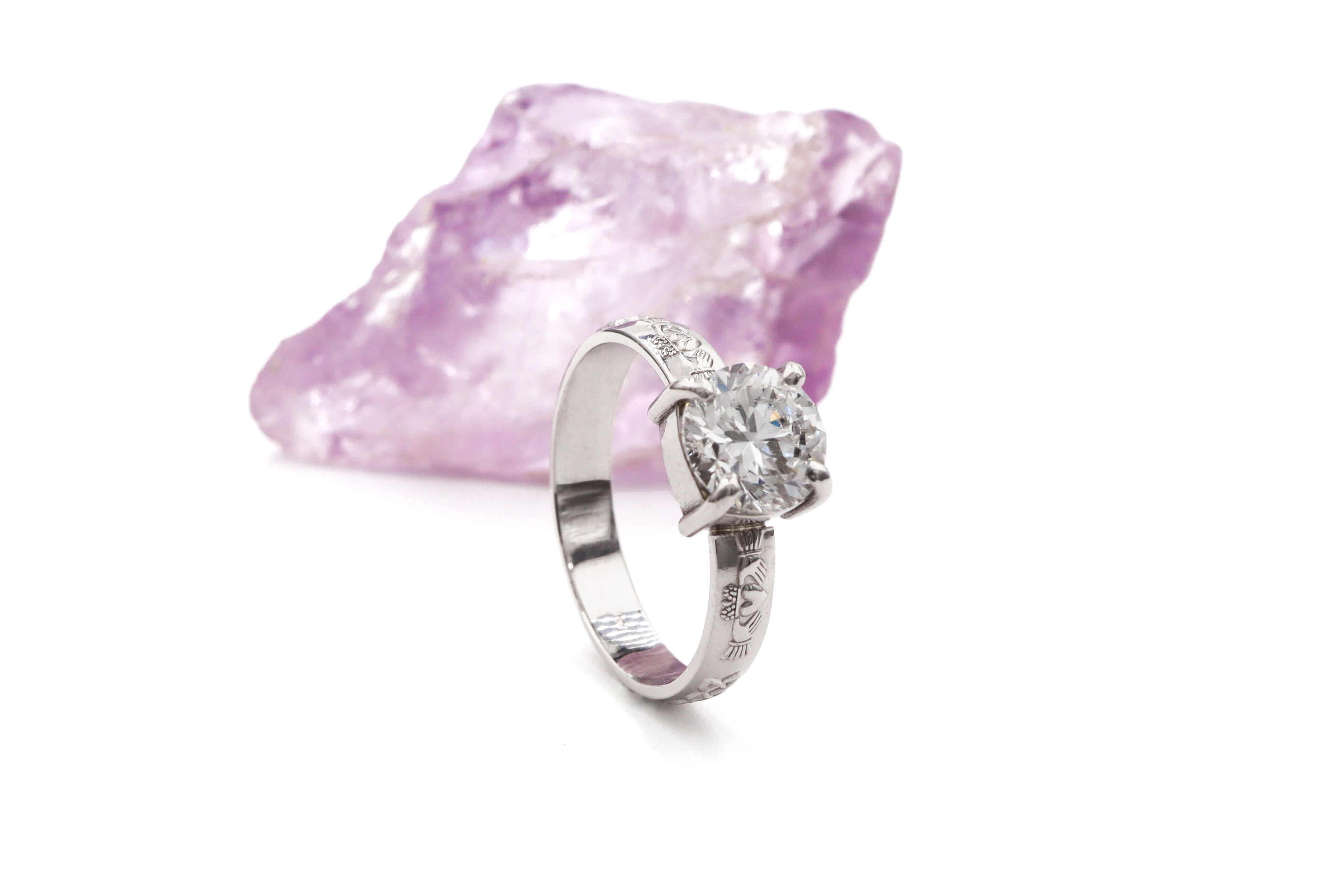 Womens Claddagh Engagement Ring in Platinum 950 With a Polished Finish. Side View.
