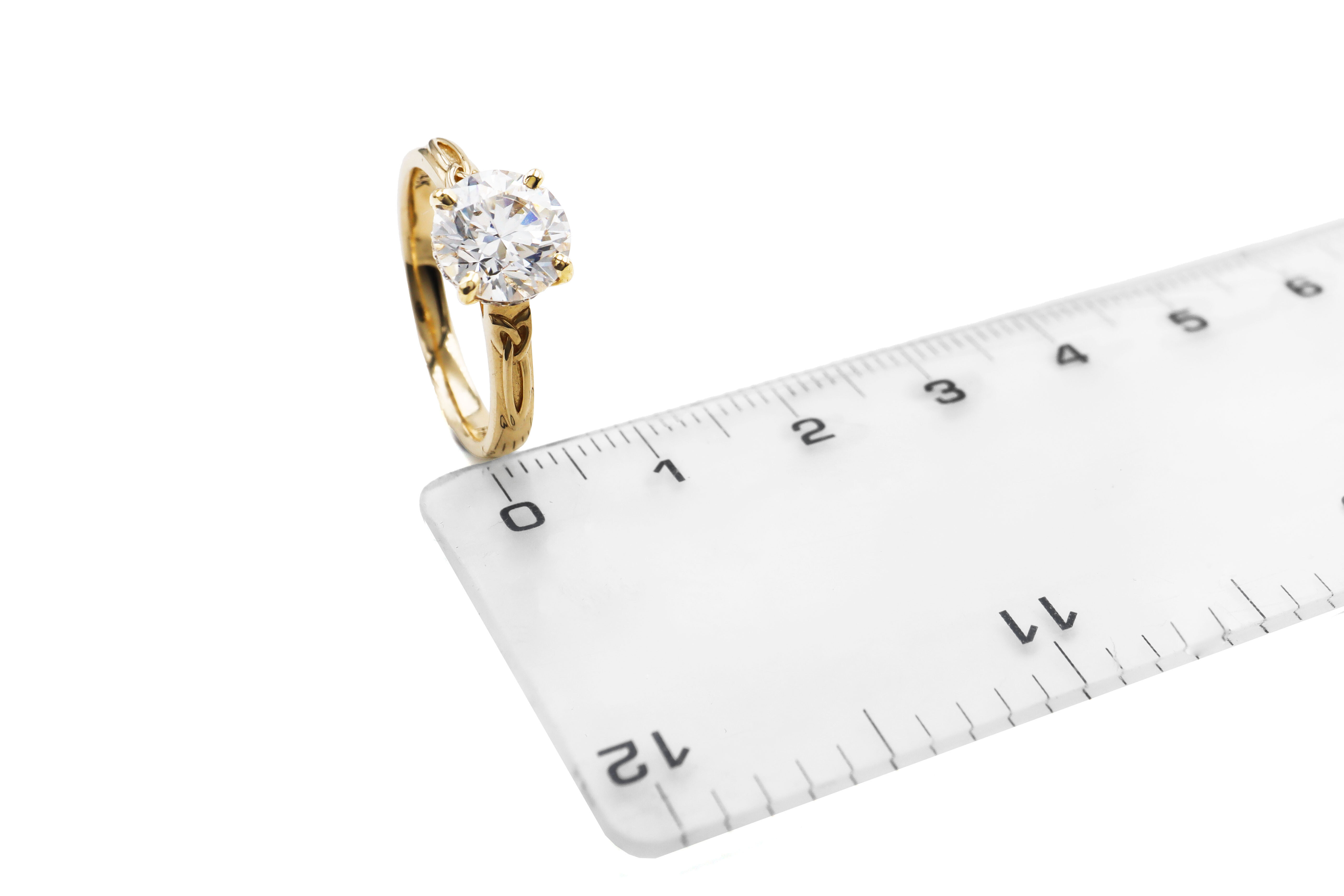 Real 14K Yellow Gold Trinity Knot 2.00ct Lab Grown Diamond Ring With a Polished Finish For Women. Picture For Scale.