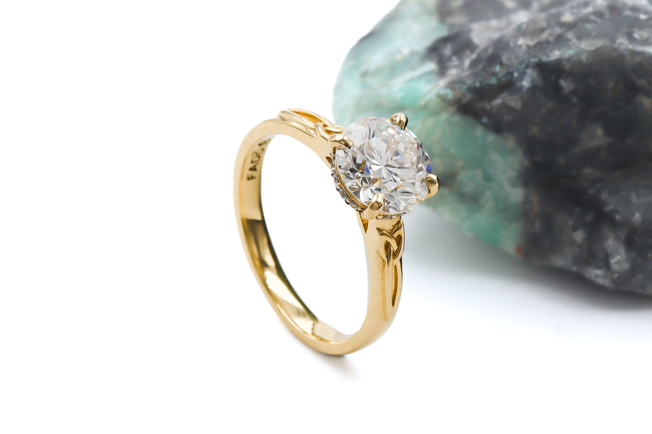 Womens Trinity Knot 2.5mm Ring in 14K Yellow Gold With a Polished Finish. Side View.