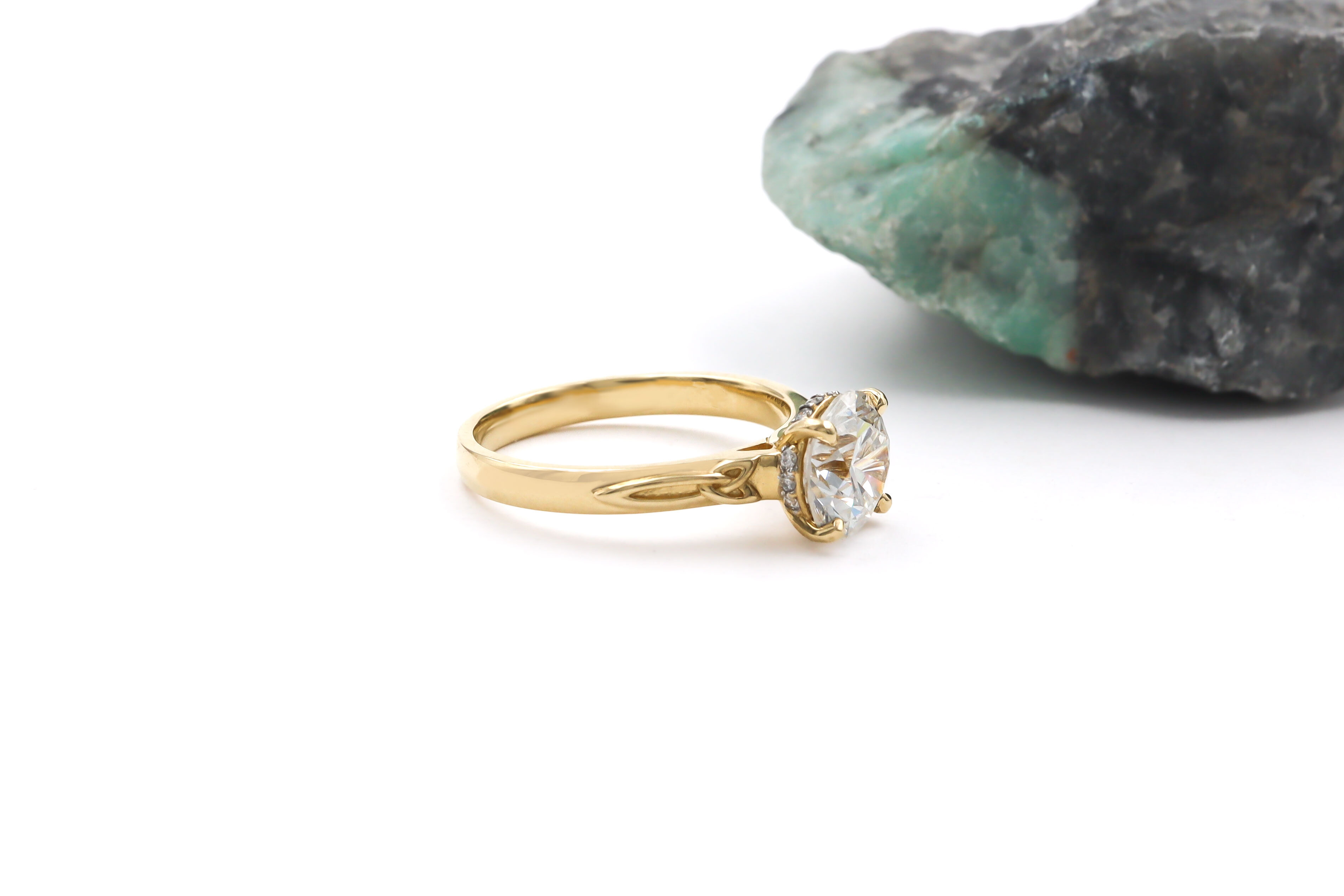 Genuine 14K Yellow Gold Trinity Knot Ring With a Polished Finish For Women. Side View.