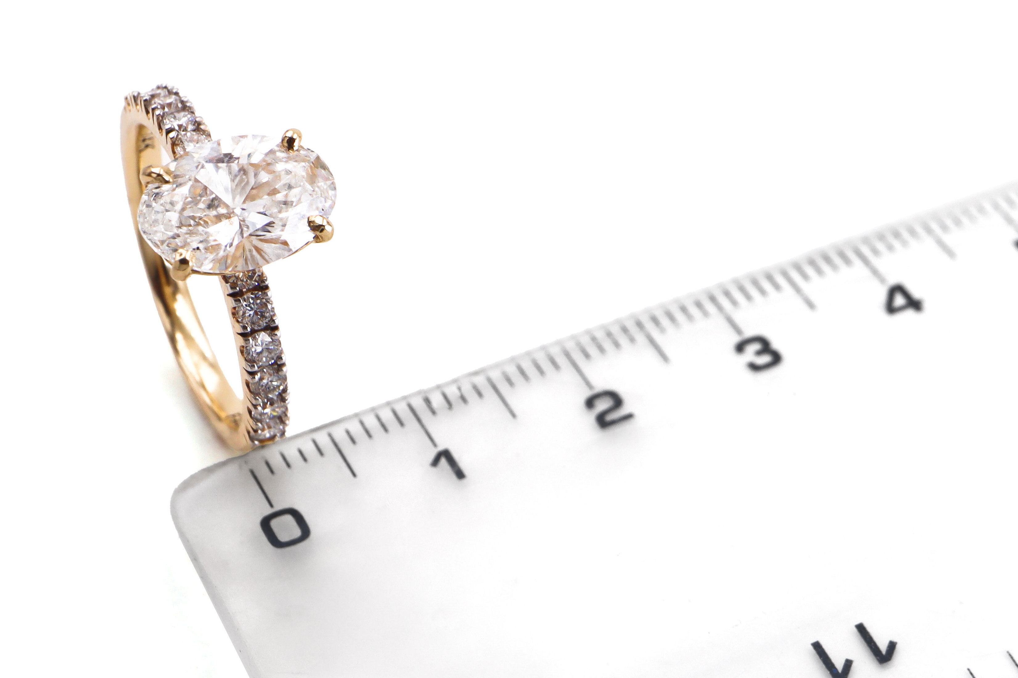Womens Polished Trinity Knot 2.00ct Lab Grown Diamond Engagement Ring in Real Yellow Gold. Picture For Scale.