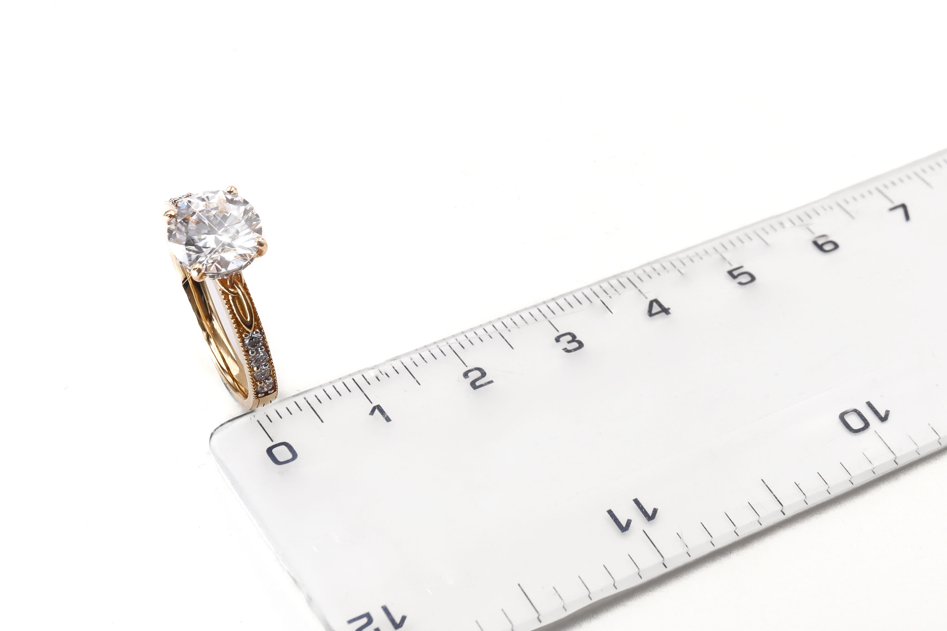 Authentic Yellow Gold Trinity Knot 2.00ct Lab Grown Diamond Ring With a Polished Finish For Women. Picture For Scale.