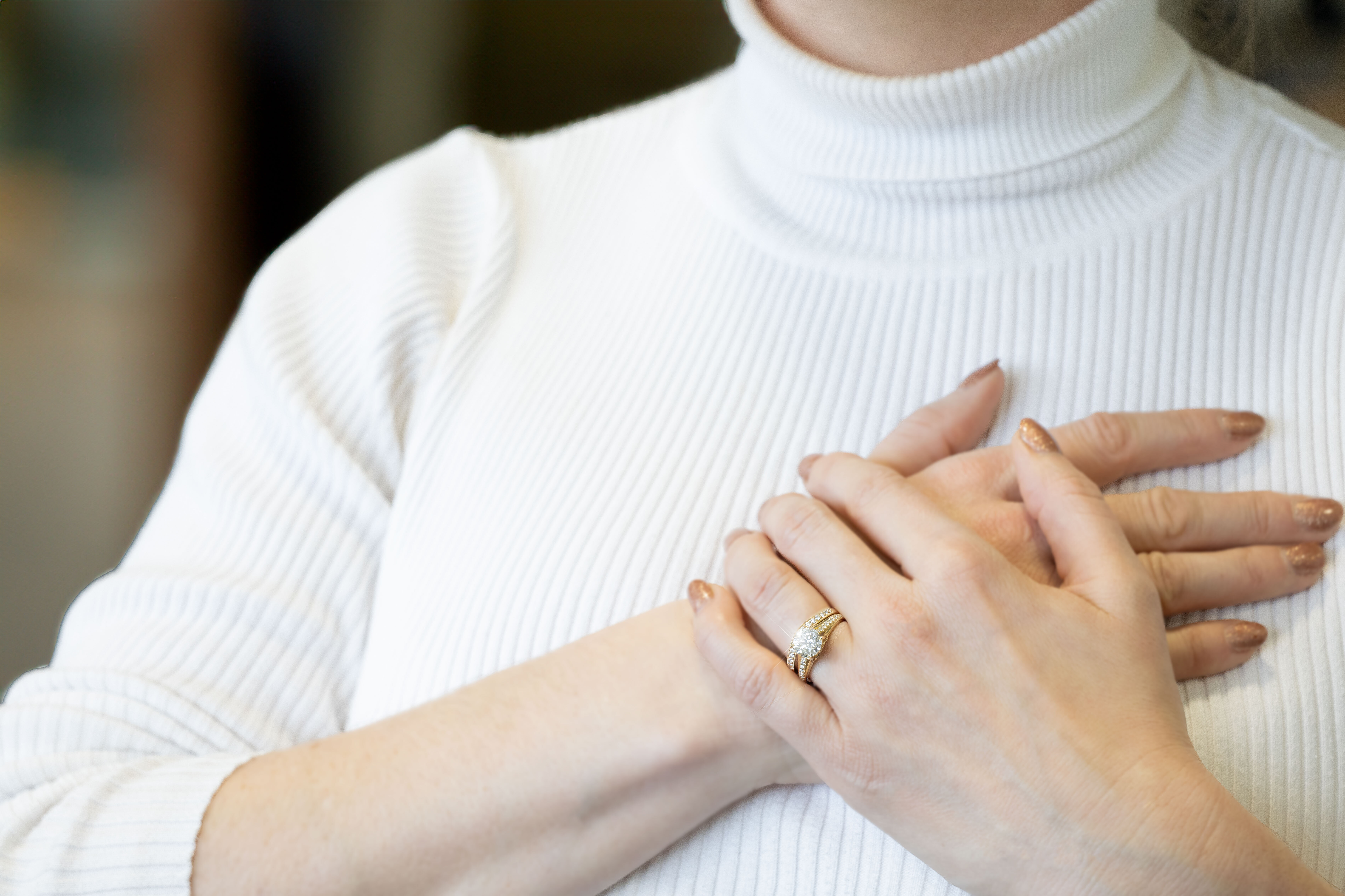 Attractive 14K Yellow Gold Trinity Knot 2.0mm Ring For Women With a Polished Finish - Model Photo