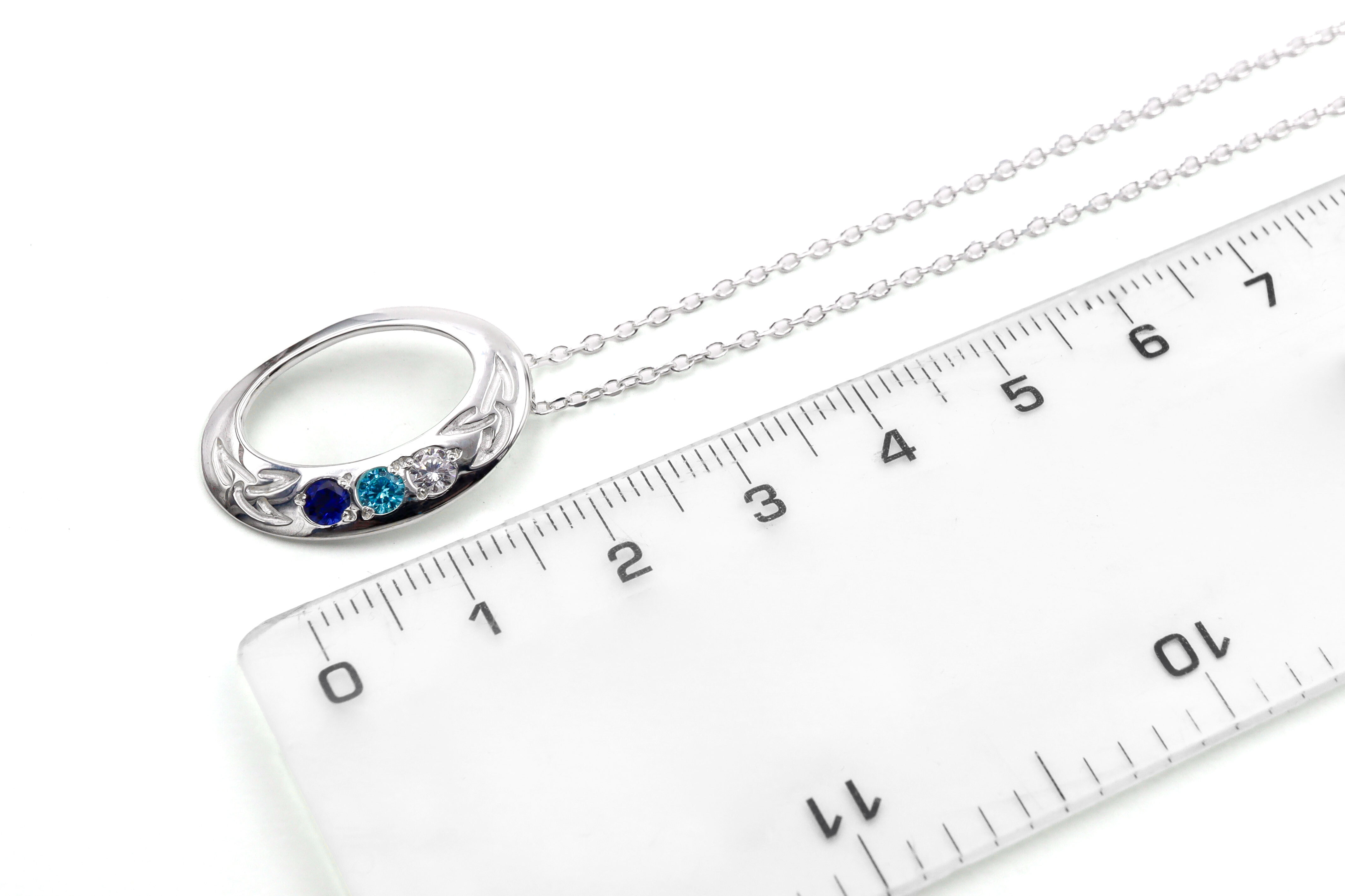 Gorgeous Sterling Silver None Birthstone Necklace With a Polished Finish For Women. Picture For Scale.