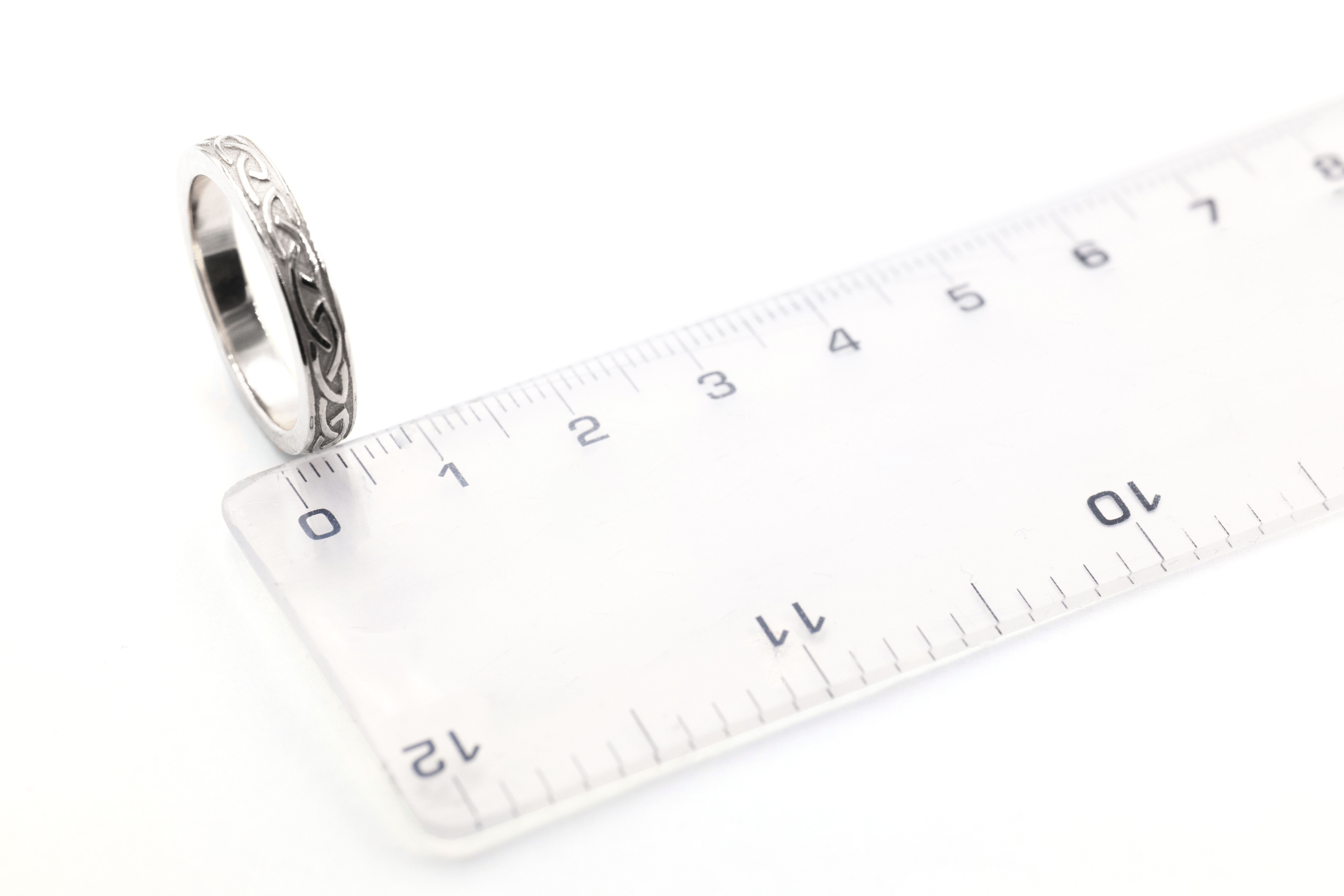 Womens White Gold Celtic Knot 5.4mm Ring. Picture For Scale.