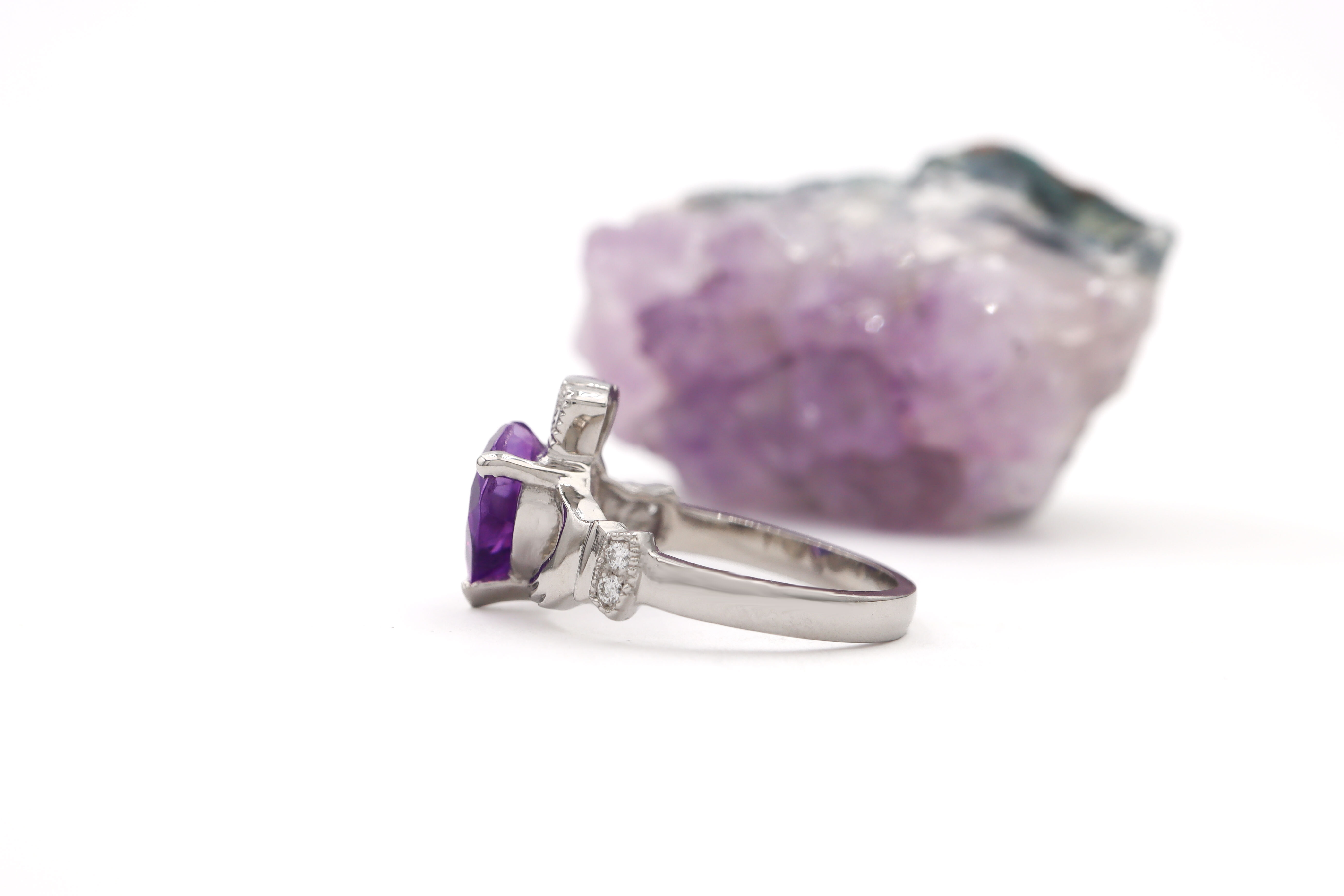 Womens Claddagh Ring in Platinum With a Polished Finish. Side View.