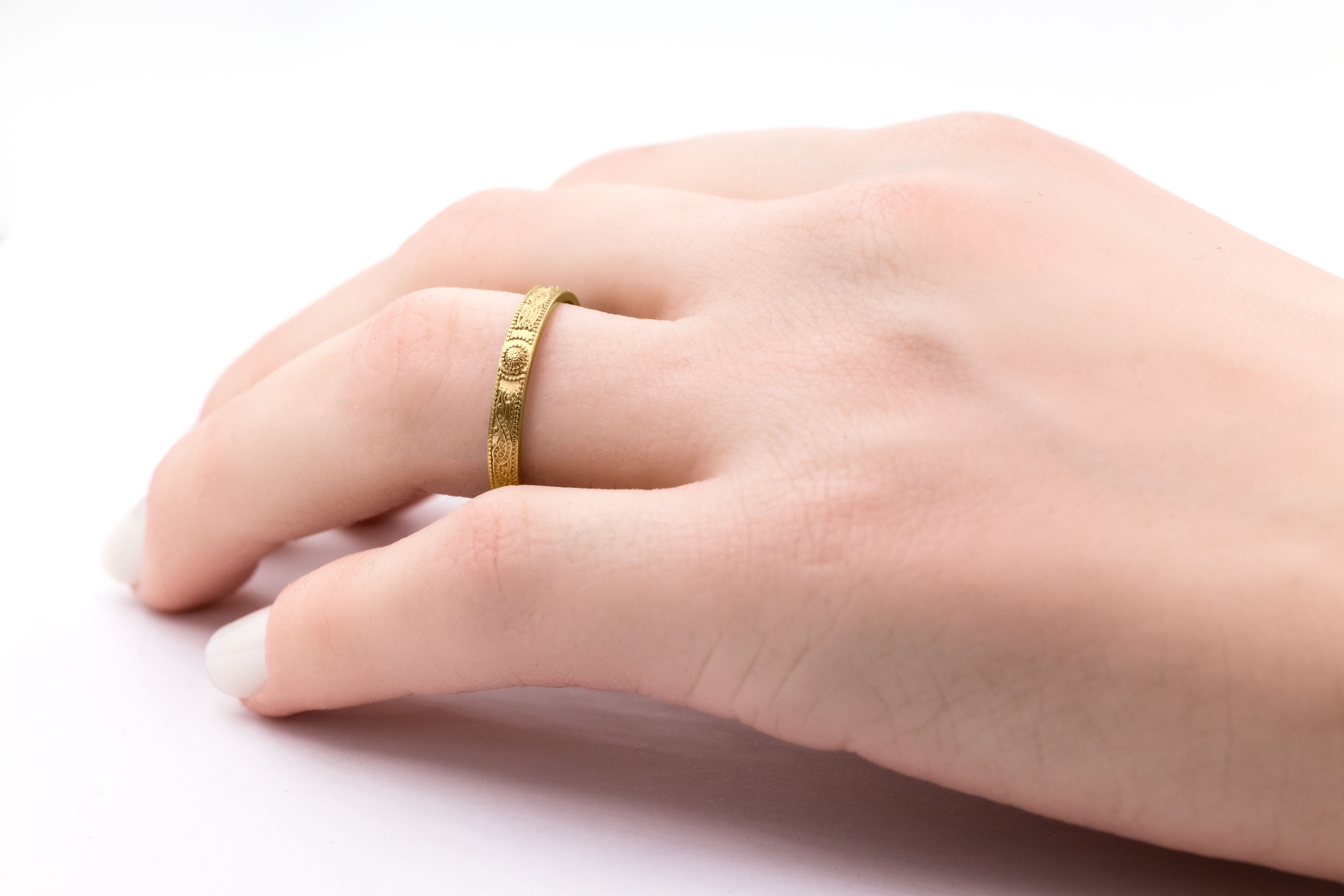 Striking 10K Yellow Gold Celtic Warrior & Celtic Knot 3.0mm Ring For Women With a Florentine Finish - Model Photo