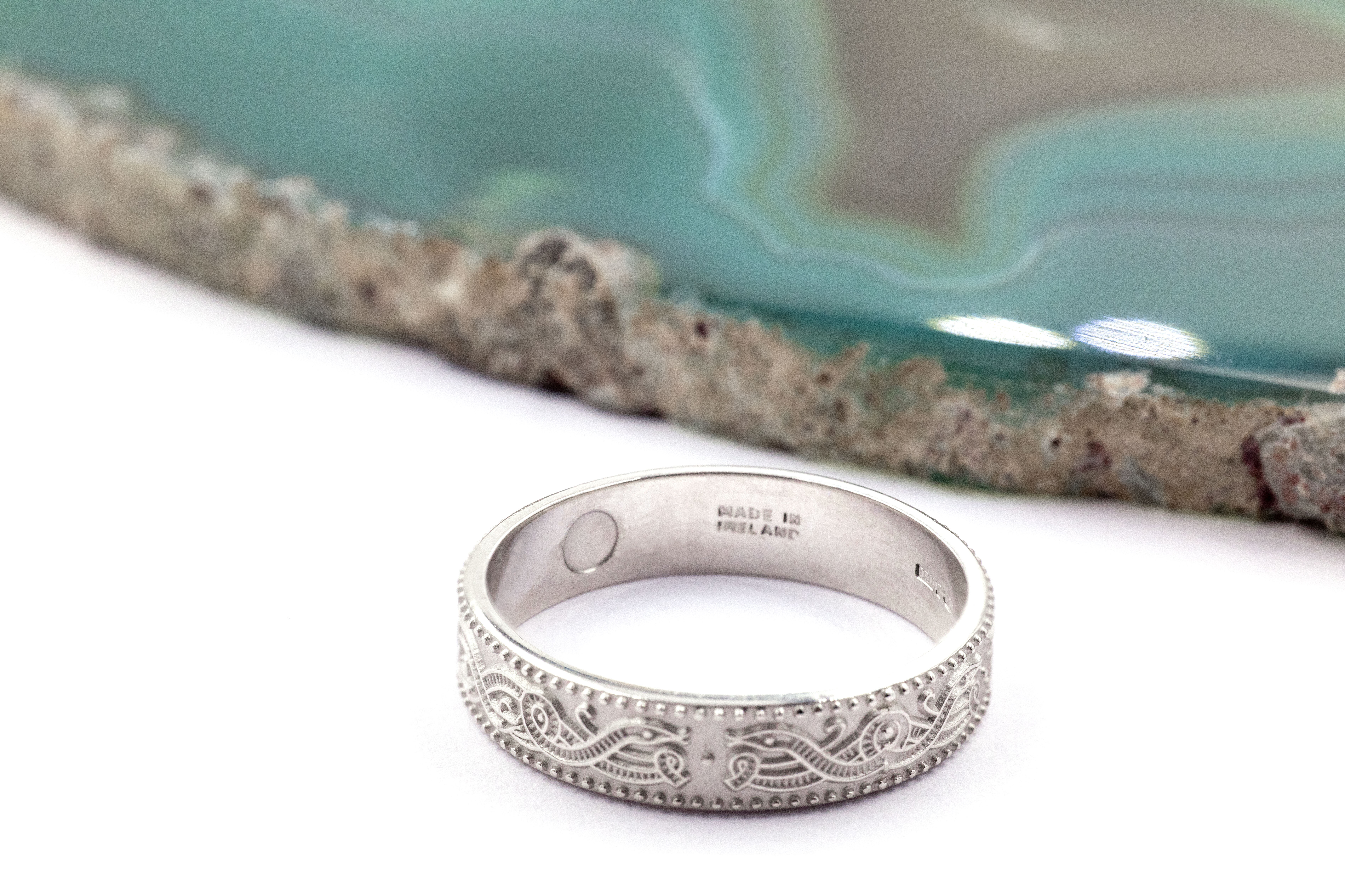 Luxurious White Gold Celtic Warrior 9.0mm Ring For Women With a Florentine Finish. Picture Of The Back.