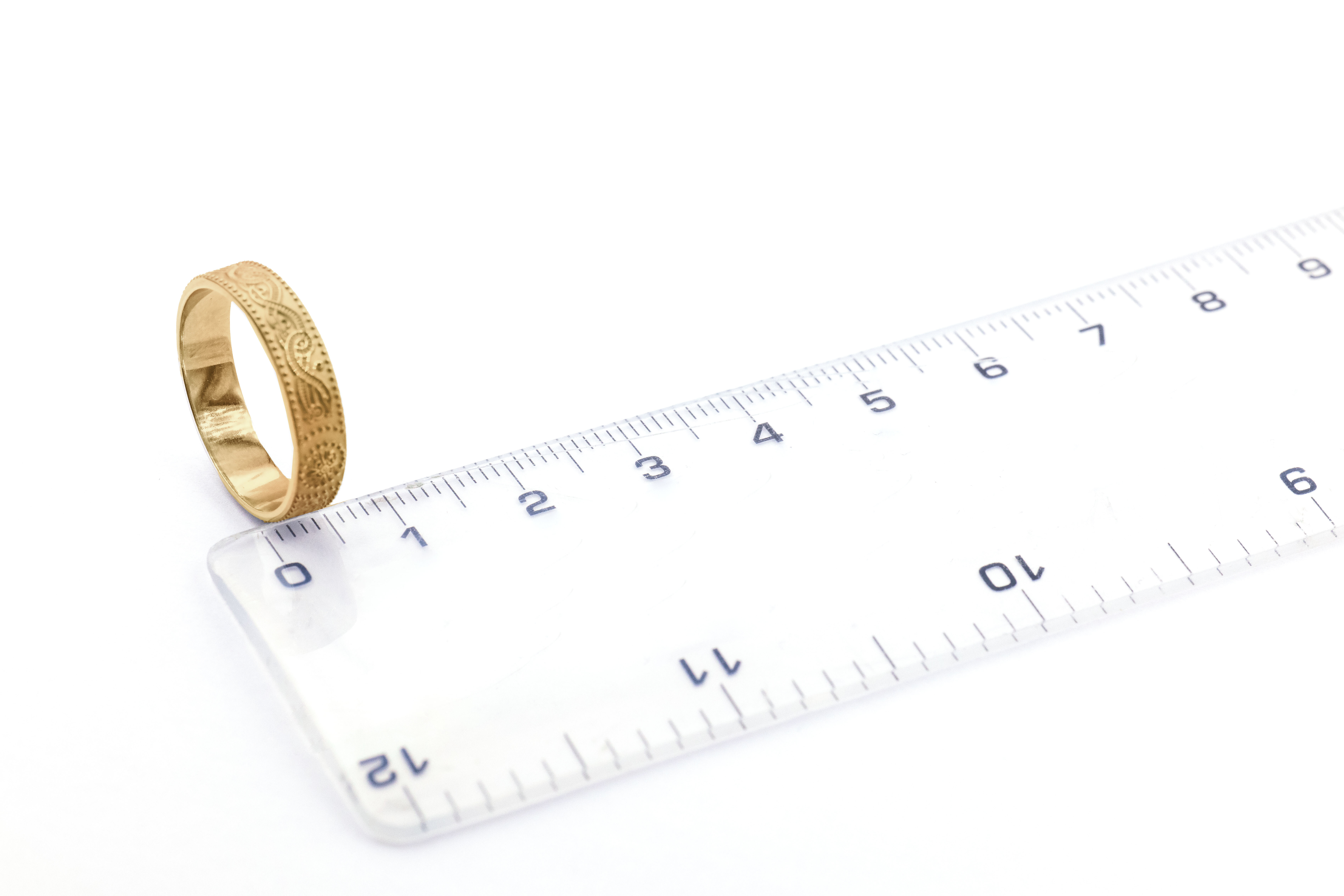 Womens Attractive Florentine Yellow Gold Celtic Warrior 6.0mm Ring. Picture For Scale.