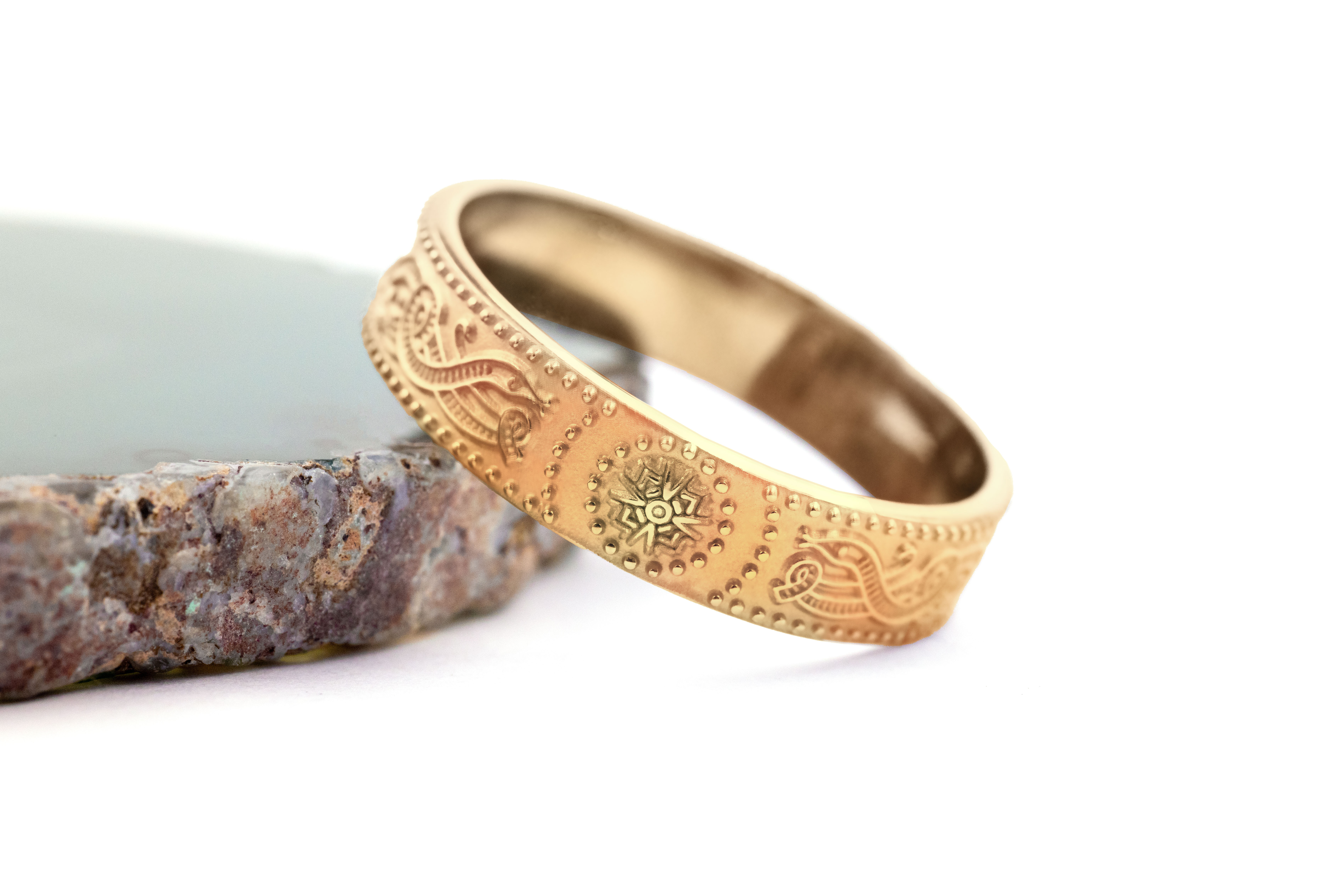 Womens Celtic Warrior 4.5mm Ring in 14K Yellow Gold With a Florentine Finish. Side View.