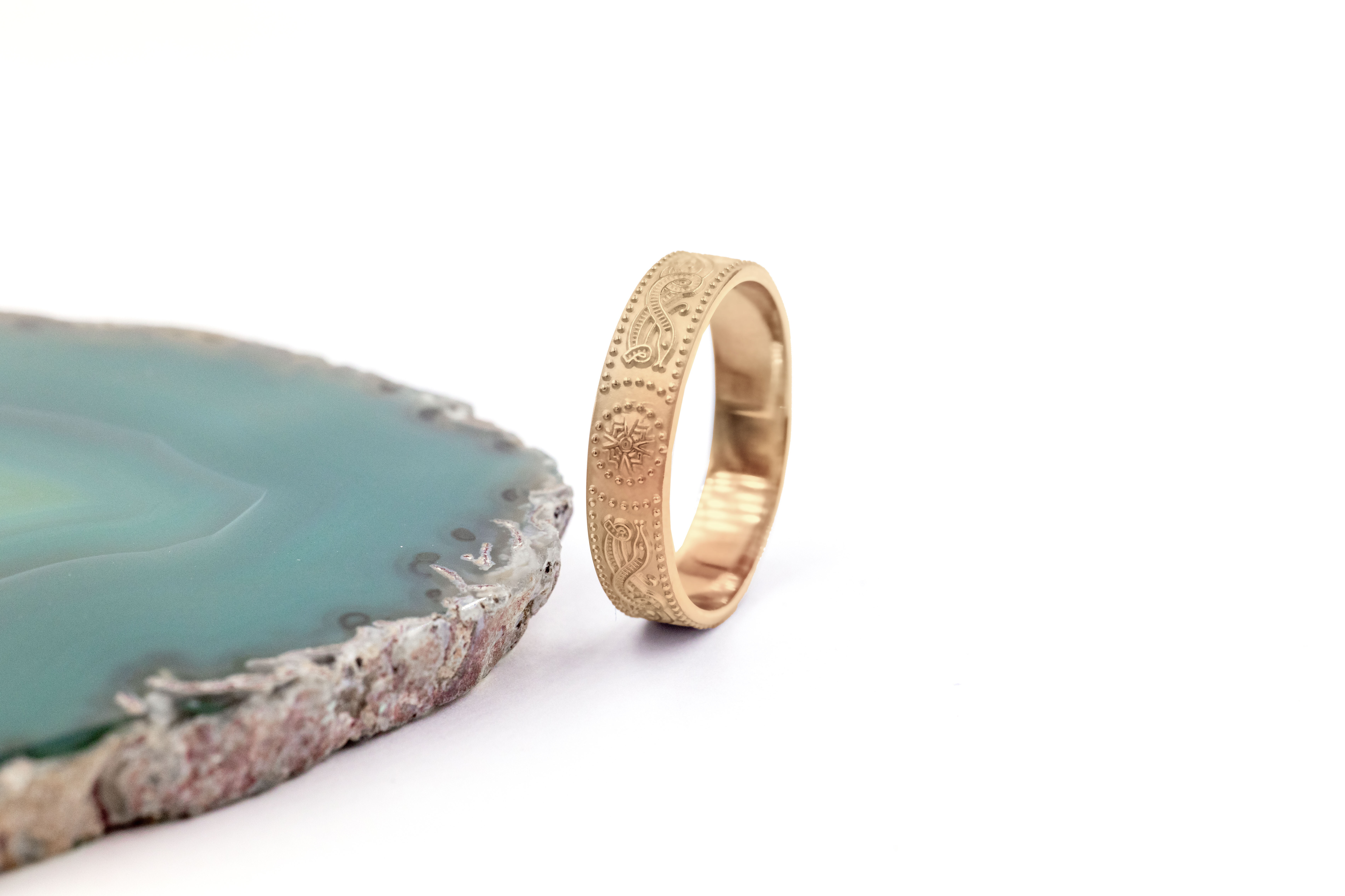 Striking Yellow Gold Celtic Warrior 4.5mm Ring For Women With a Florentine Finish. Side View.