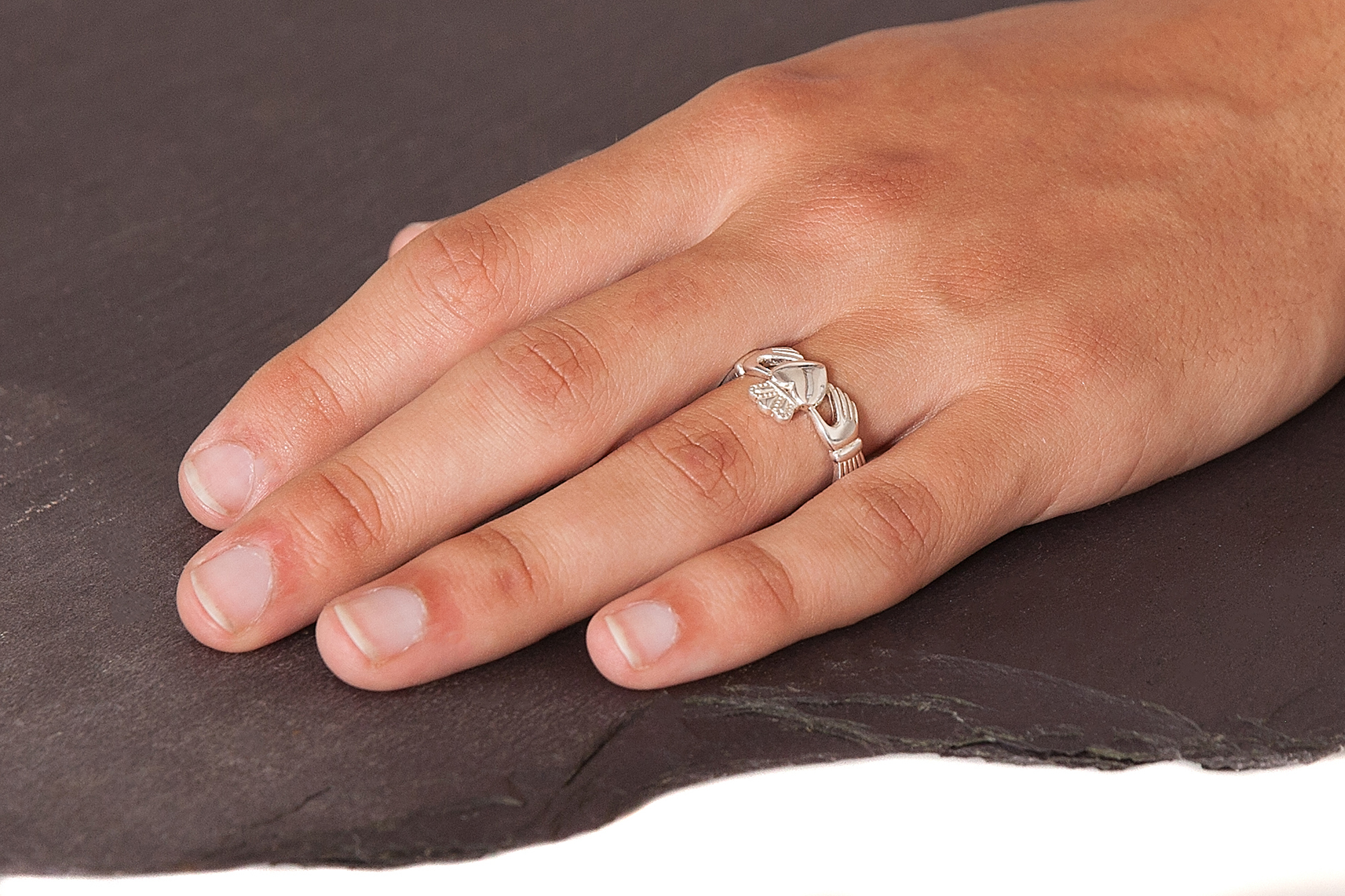 Man wearing claddagh ring sale