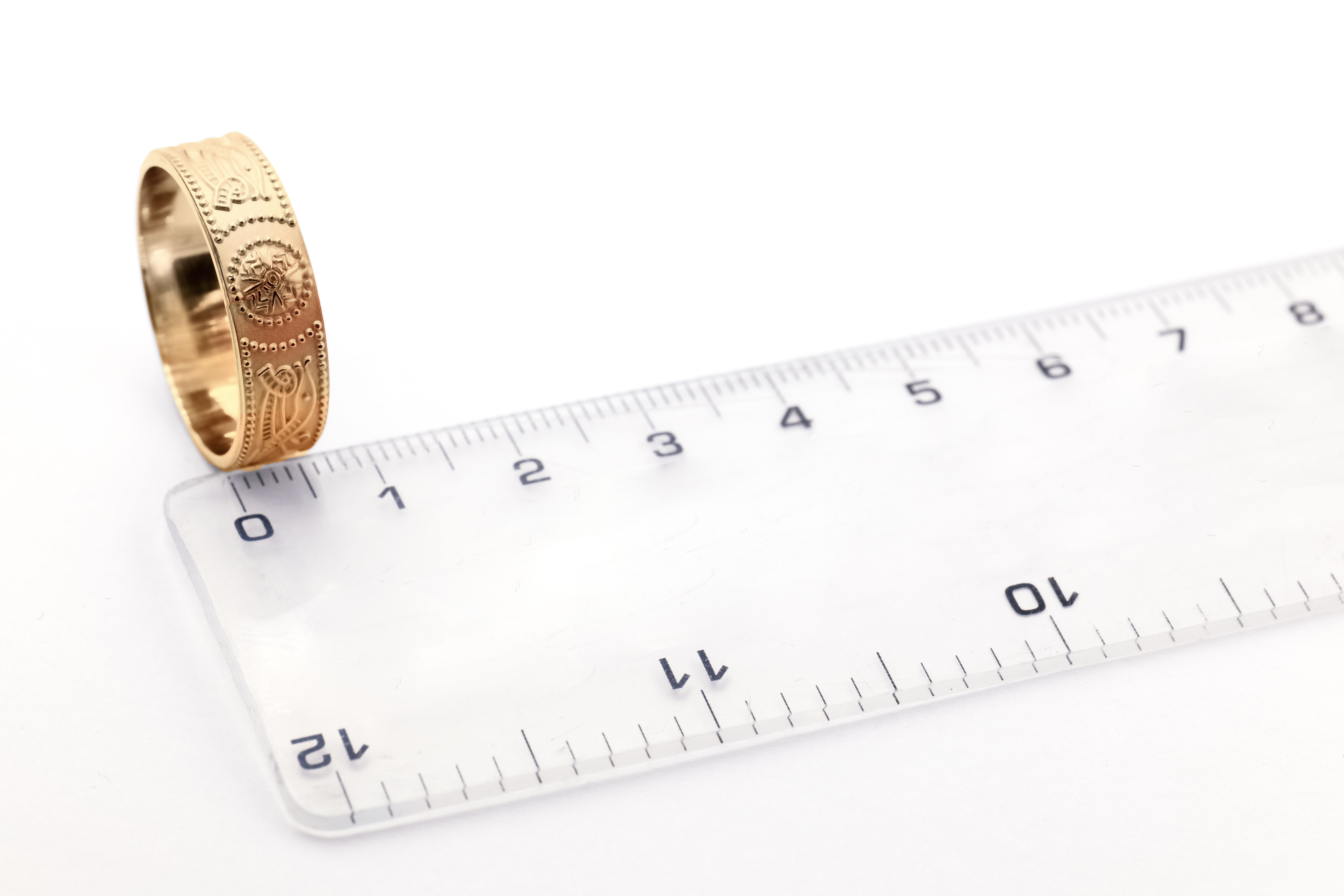Irish Yellow Gold Celtic Warrior 9.0mm Ring For Men With a Florentine Finish. Picture For Scale.