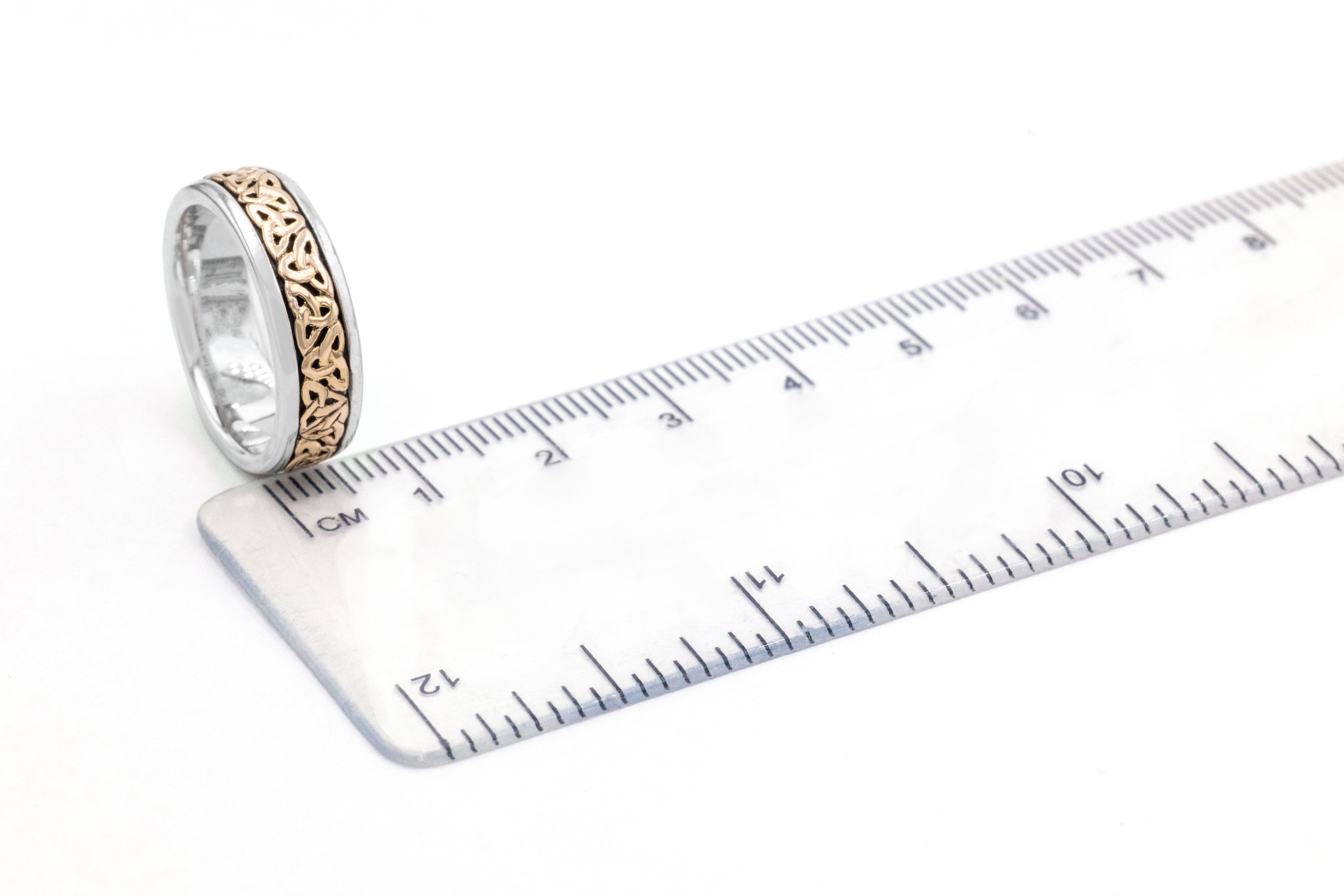 Gorgeous Sterling Silver & 10K Yellow Gold Celtic Knot 6.0mm Ring With a Oxidised Finish For Women. Picture For Scale.