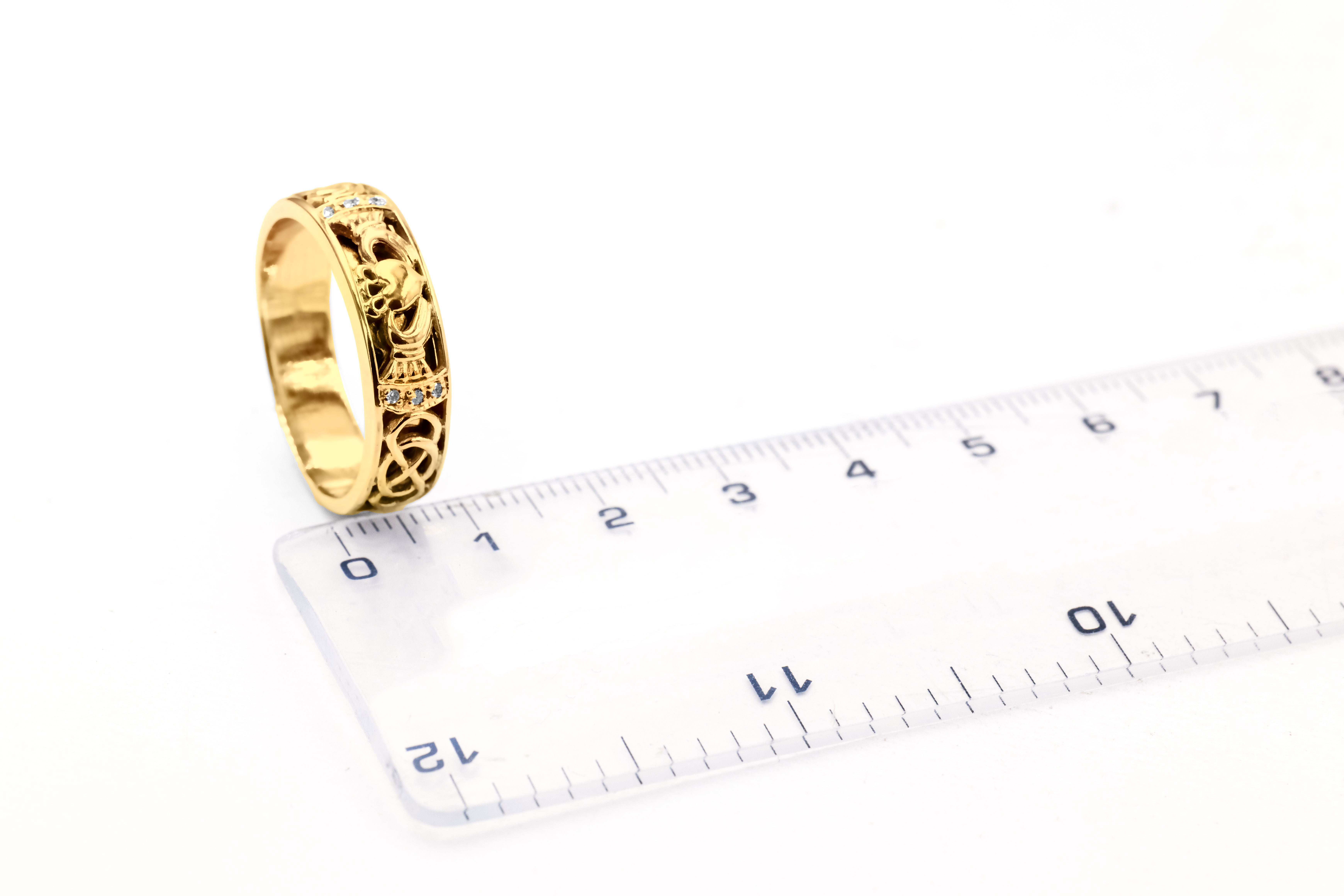 Mens Claddagh & Celtic Knot 5.0mm Ring in Real Yellow Gold. Picture For Scale.