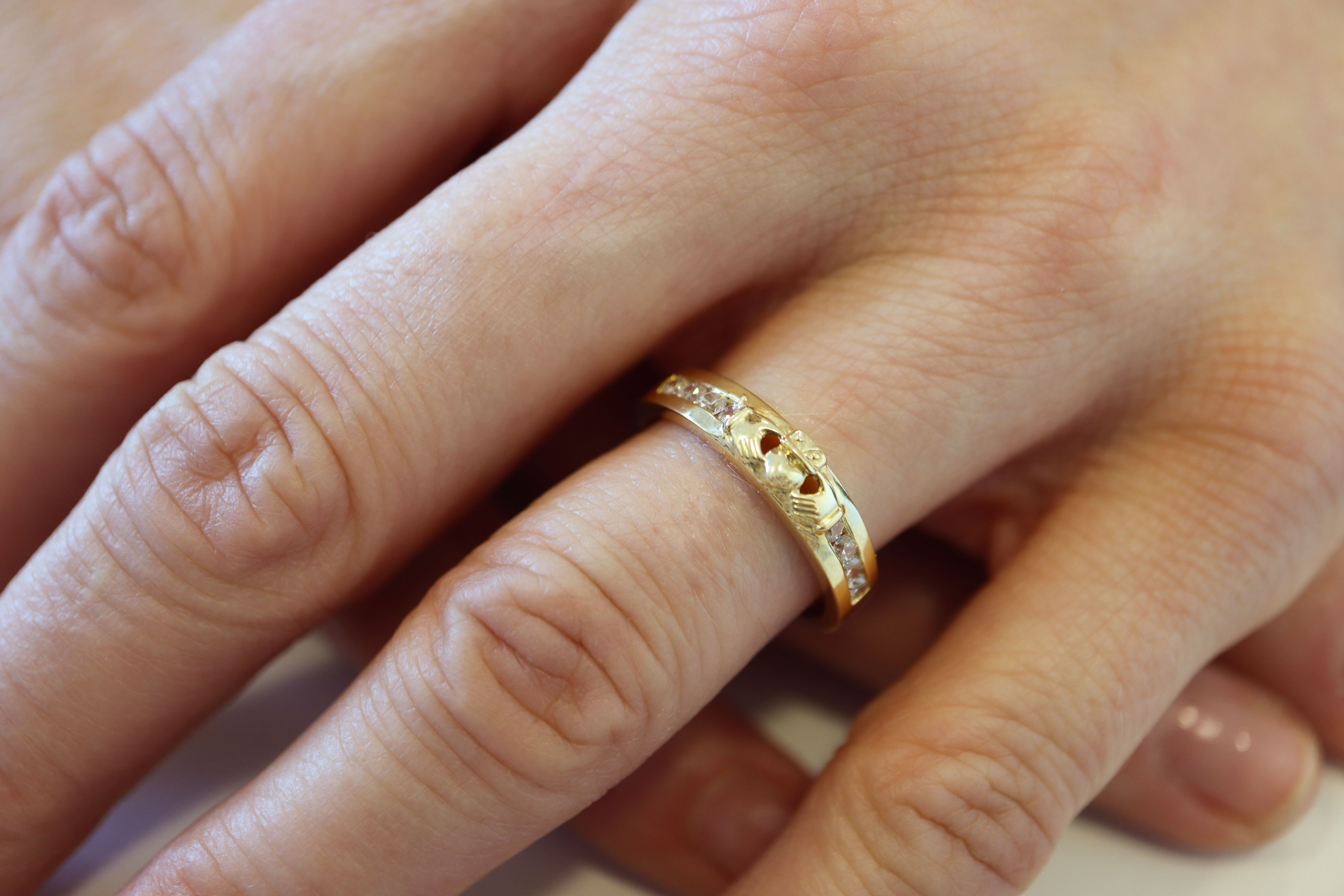 Striking 9K Yellow Gold Claddagh Anniversary Ring For Women - Model Photo