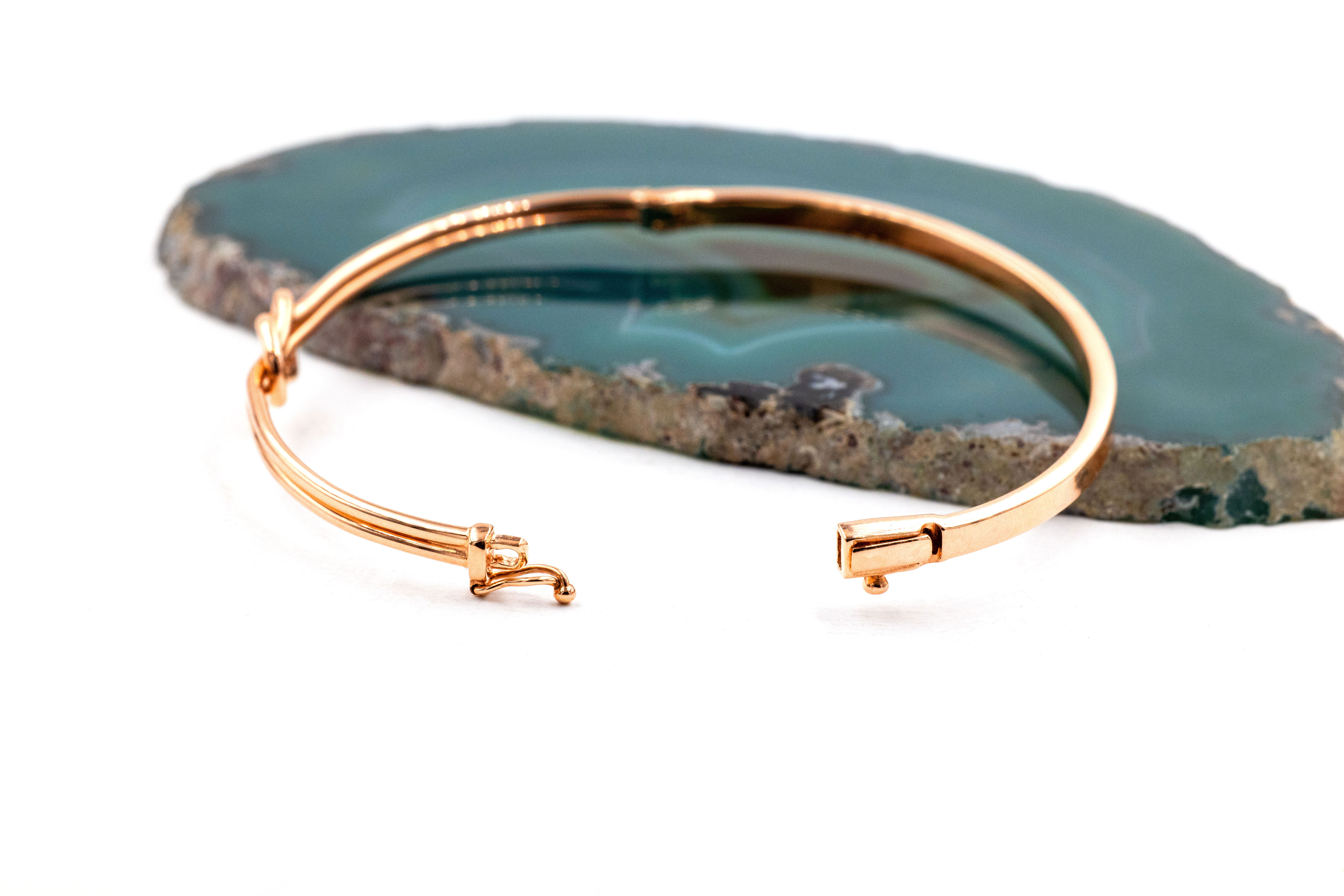 Womens Celtic Knot Bracelet in Rose Gold With a Polished Finish