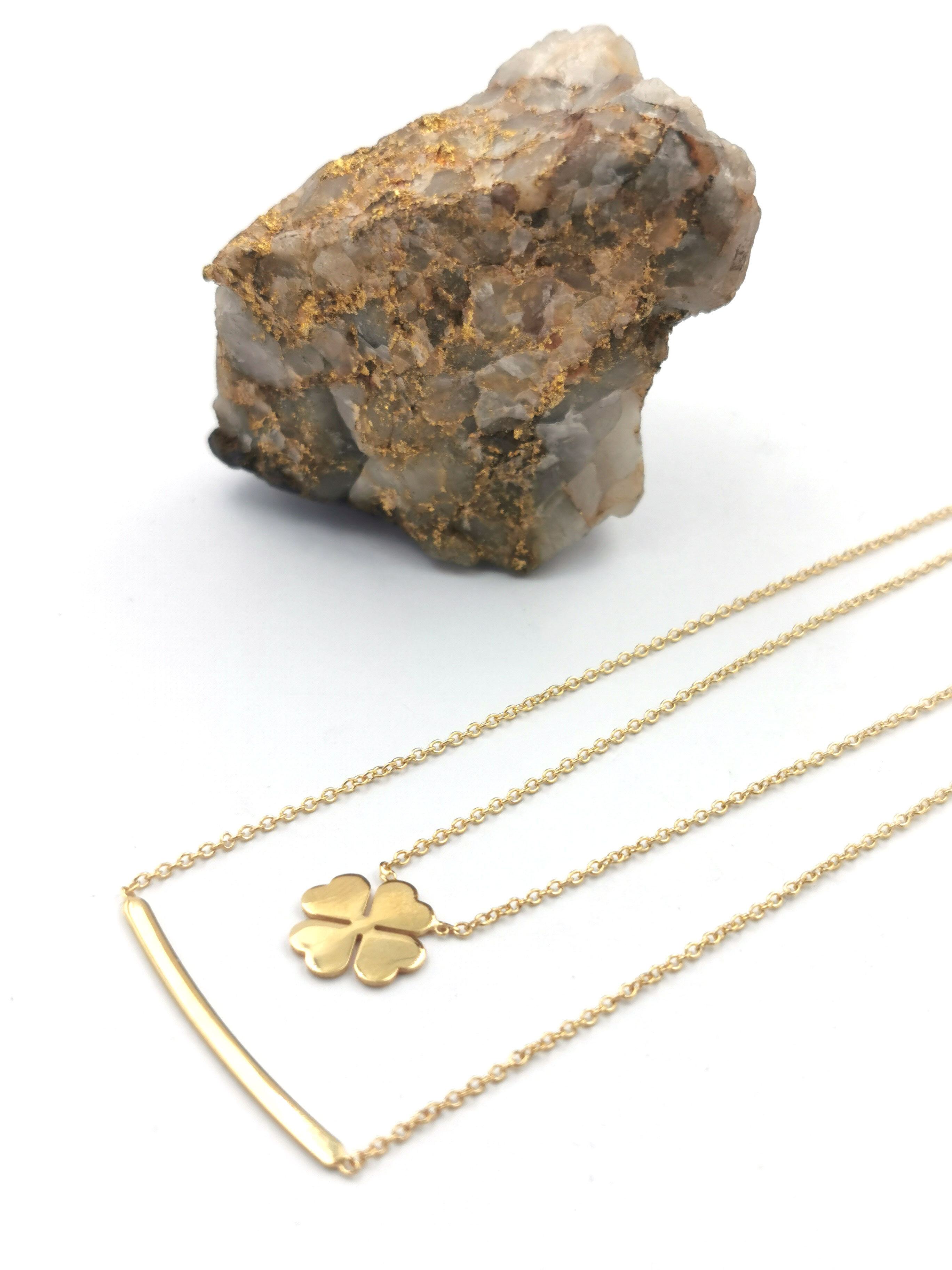 Womens Shamrock Necklace in Real Yellow Gold. Pictured Flat.