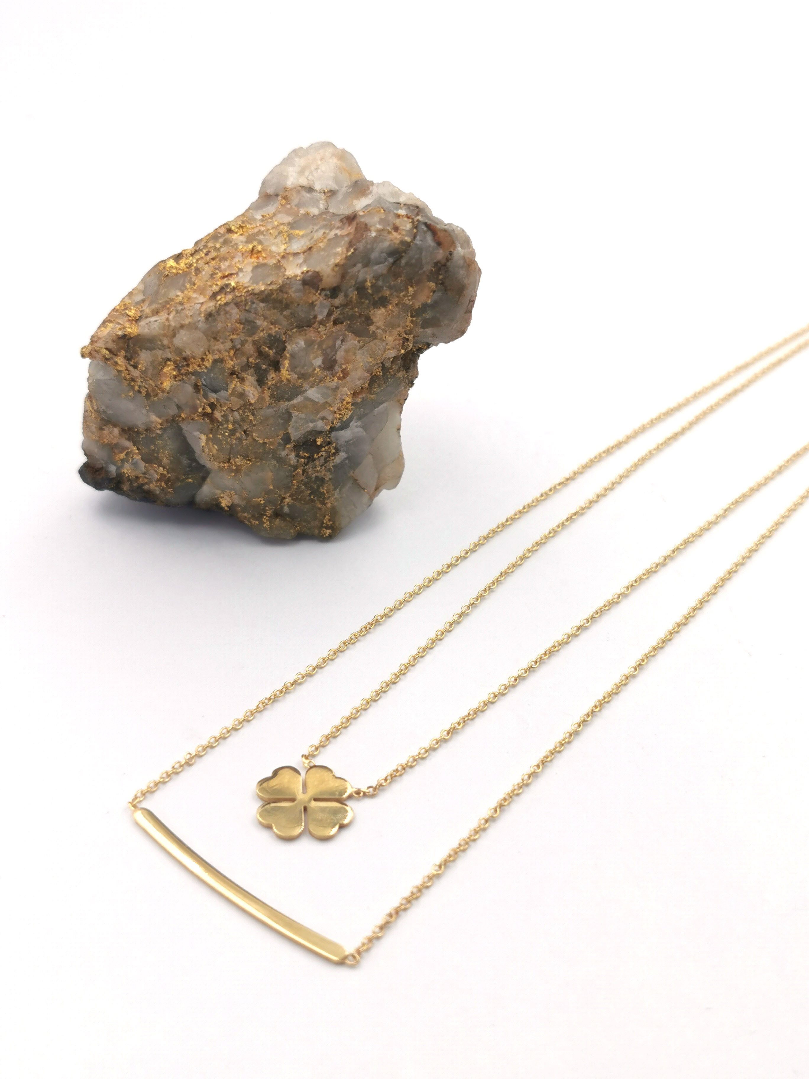 Womens Authentic Yellow Gold Shamrock Necklace. Pictured Flat.