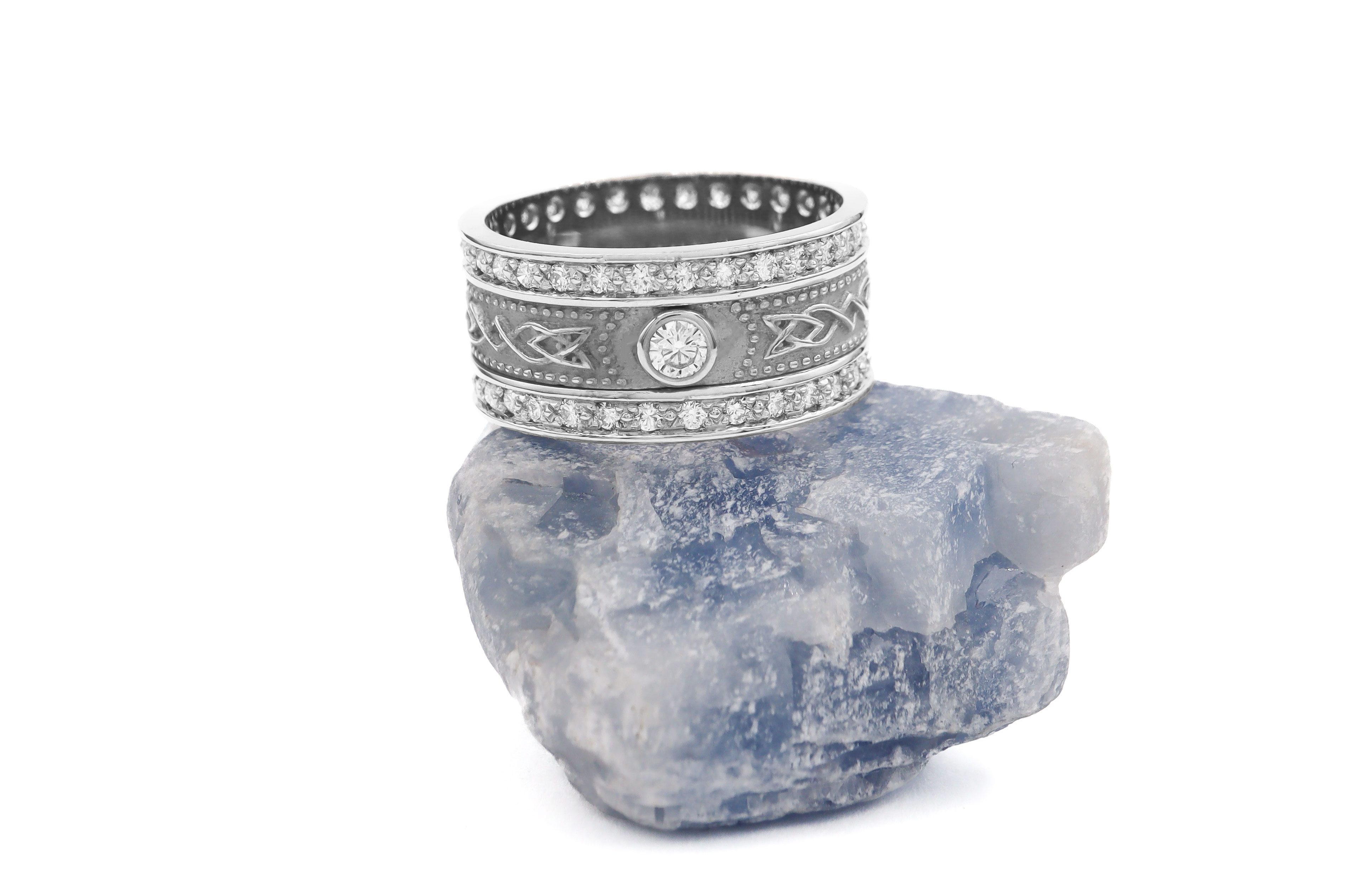 Attractive Platinum Celtic Knot 9.5mm Ring With a Florentine Finish For Women