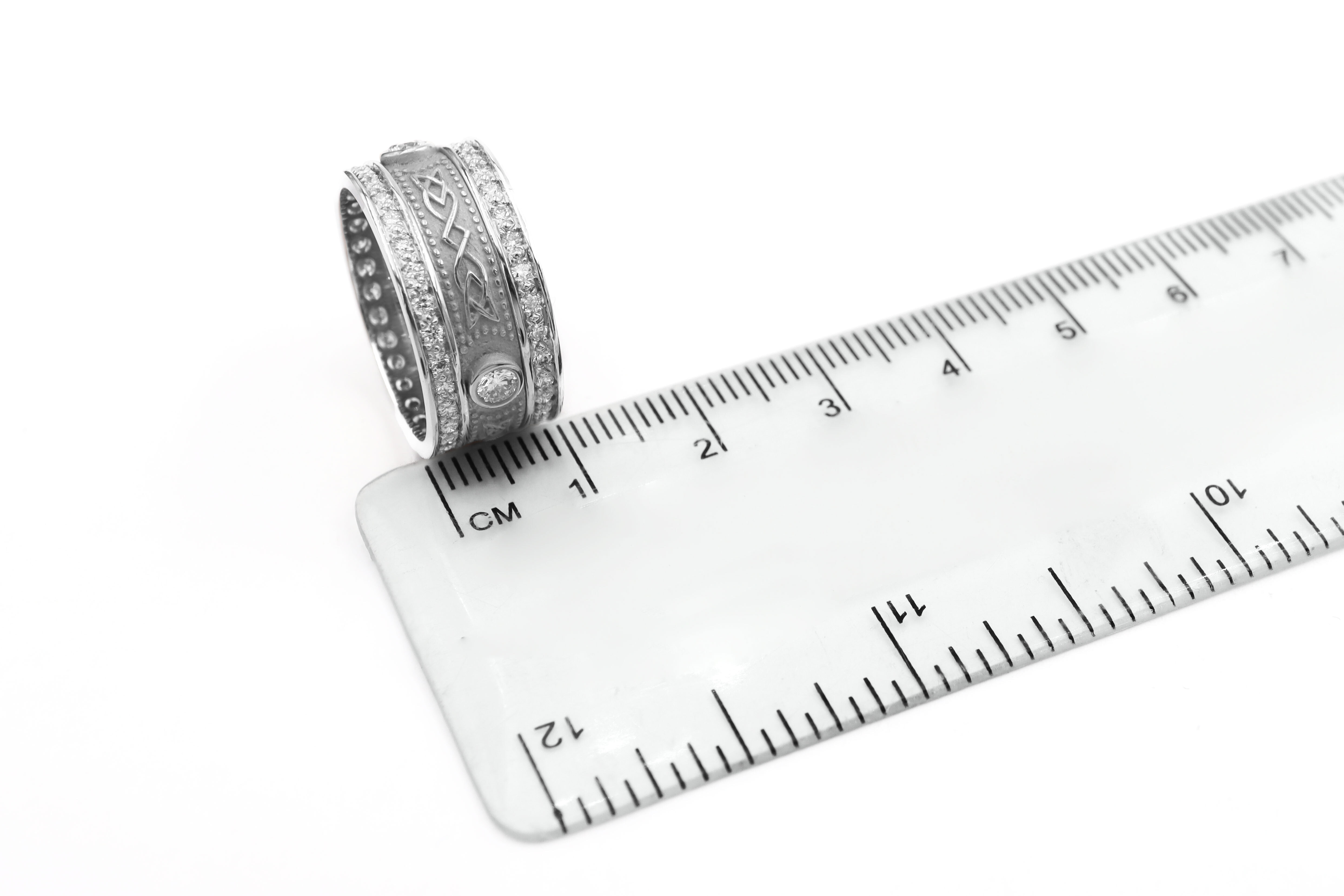 Real Platinum Celtic Knot & Ardagh Chalice 9.5mm Ring For Women With a Florentine Finish. Picture For Scale.