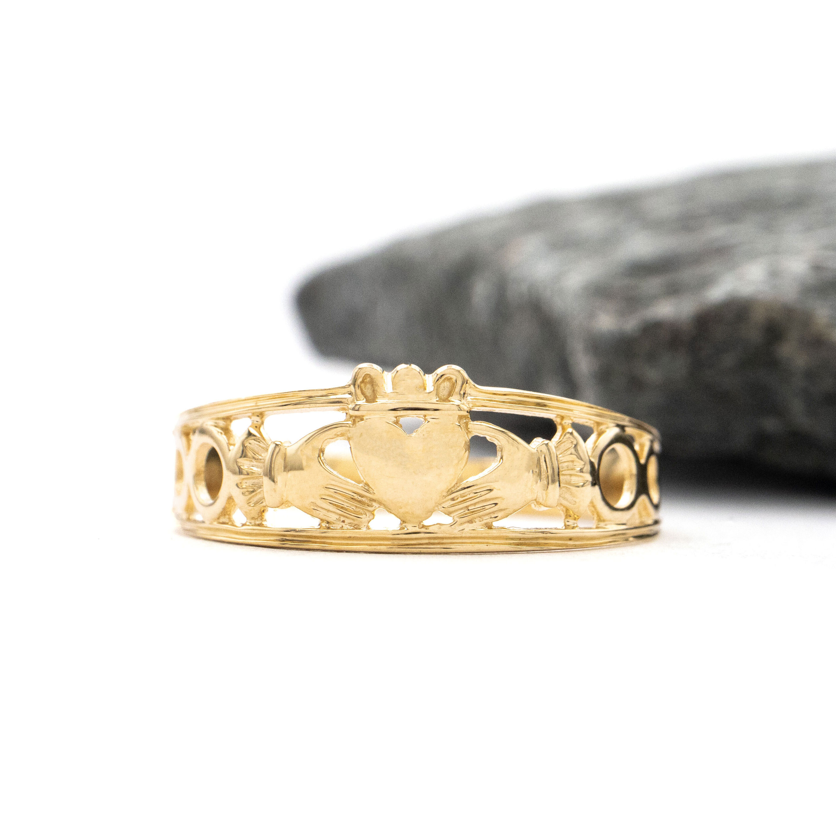 Womens Attractive Yellow Gold Claddagh Ring. Side View.